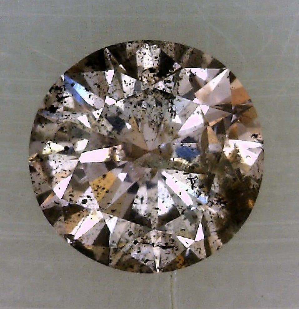 Loose Diamond - ROUND 0.3ct Fancy Grayish Pink Purple: Loose Diamond - ROUND 0.3ct Fancy Grayish Pink Purple Source: Natural Shape: ROUND Carats: 0.3 Color: Fancy Grayish Pink Purple Certification: GIA The Diamond Depot Guarantee: All items in this auctio