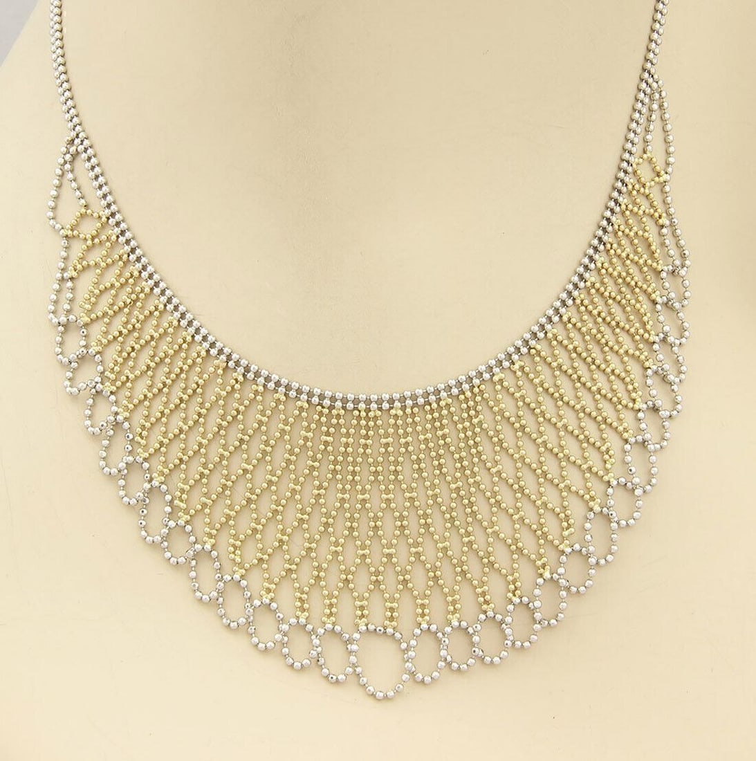 Unbranded 14k White Yellow Gold Double Strand Drape Beaded Necklace: Unbranded 14k White Yellow Gold Double Strand Drape Beaded Necklace This pre-owned double strand beaded wide fancy drape necklace is crafted in 14k white and yellow gold and features a layered silhoue