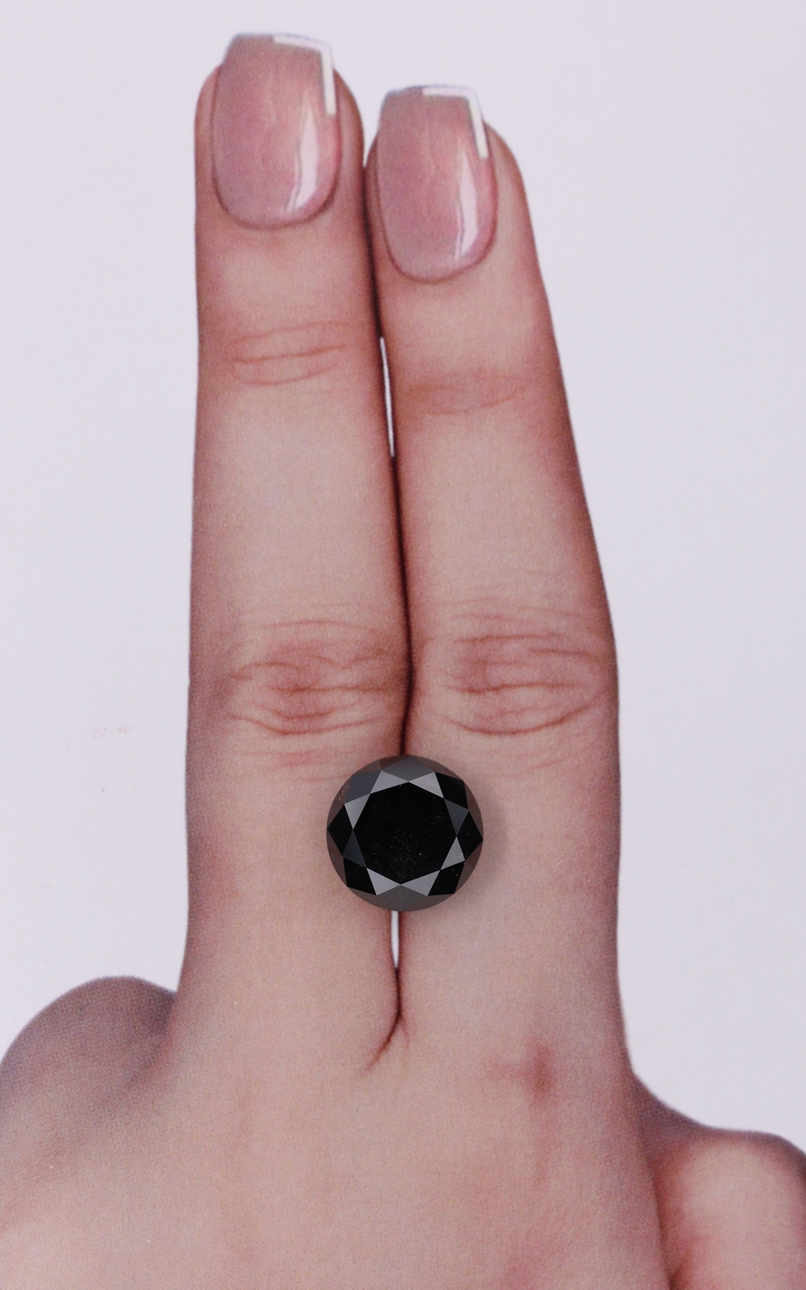 Loose Diamond - ROUND 6.42ct Fancy Black VVS2: Loose Diamond - ROUND 6.42ct Fancy Black VVS2 Source: Natural Shape: ROUND Carats: 6.42 Color: Fancy Black Certification: NONE Video: