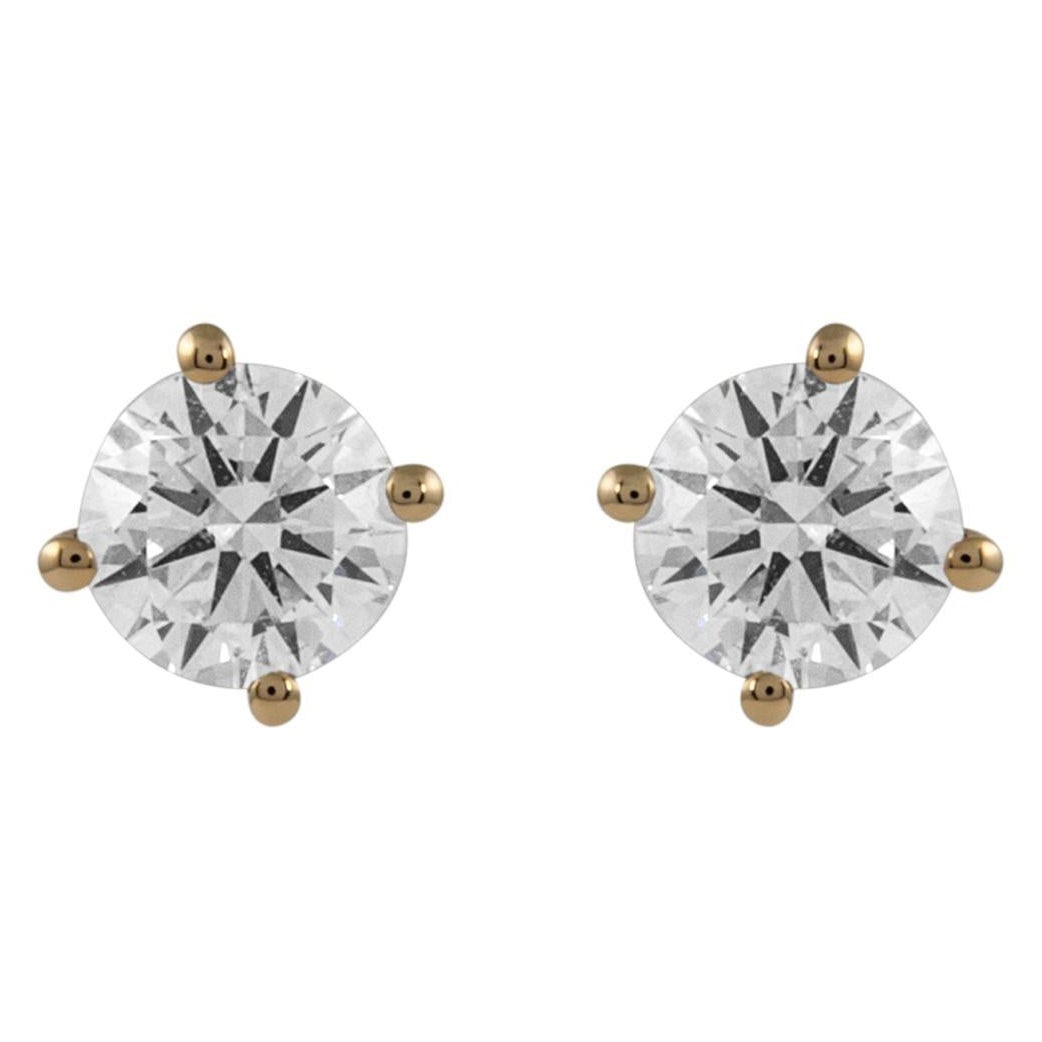 1.03ct Round Diamond Stud Earrings in 18k Yellow Gold with GIA Appraisal: 1.03ct Round Diamond Stud Earrings in 18k Yellow Gold with GIA Appraisal Elevate your style with these exquisite 1.03ct Round Diamond Stud Earrings crafted from 18k yellow gold. Featuring two matching