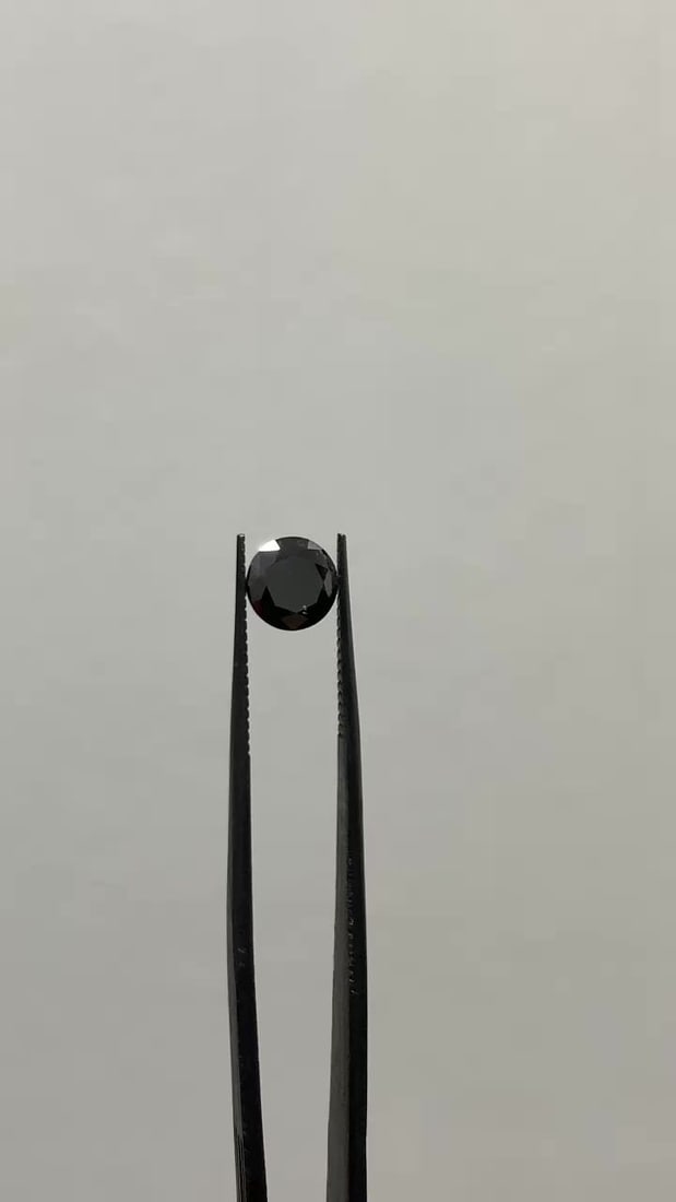 Loose Diamond - ROUND 1.41ct Fancy Black VVS2: Loose Diamond - ROUND 1.41ct Fancy Black VVS2 Source: Natural Shape: ROUND Carats: 1.41 Color: Fancy Black Certification: GIA Video: