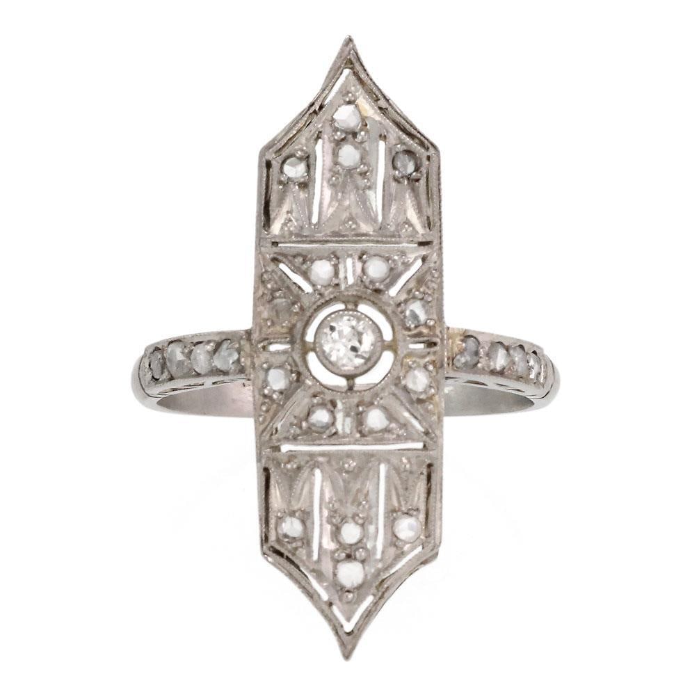 Platinum Art Deco Ring with Rose Cut Diamonds Size 8.25: Platinum Art Deco Ring with Rose Cut Diamonds Size 8.25 This exquisite Art Deco ring is crafted from platinum and features a striking elongated shape measuring 1.20 inches in length with elegant point