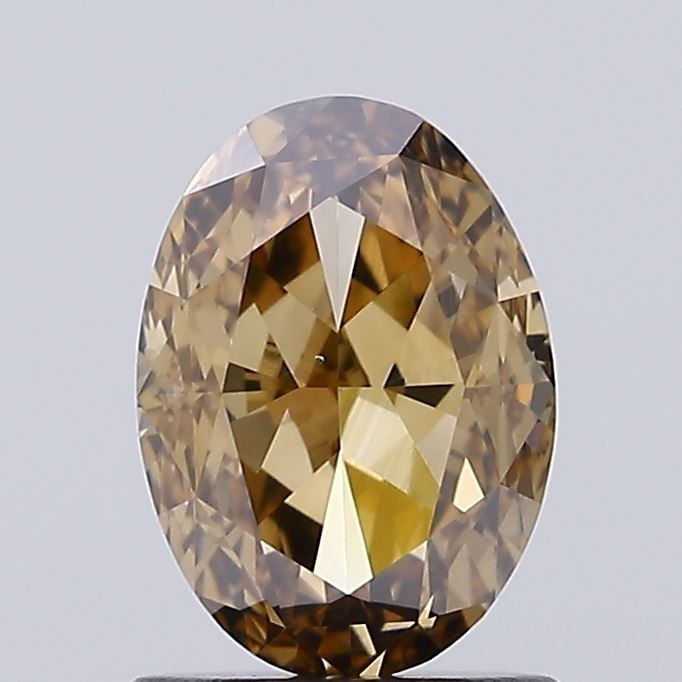 Loose Diamond - OVAL 1.59ct Fancy Brown VS2: Loose Diamond - OVAL 1.59ct Fancy Brown VS2 Source: Natural Shape: OVAL Carats: 1.59 Color: Fancy Brown Certification: NONE Video: