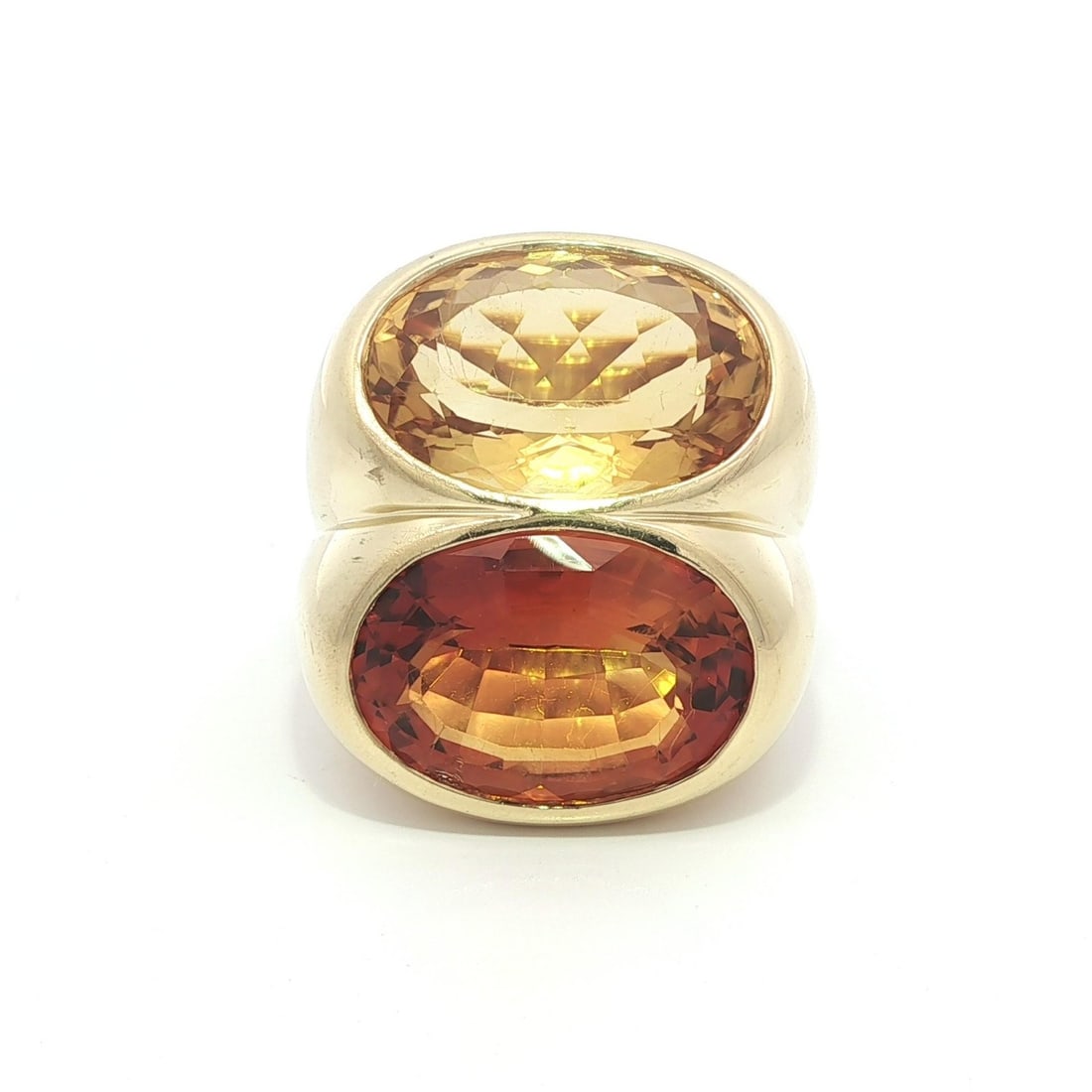 Heavy 18k Yellow Gold Dual Orange Citrine Statement Ring: Heavy 18k Yellow Gold Dual Orange Citrine Statement Ring Make a bold statement with this exquisite 18k Yellow Gold ring featuring two stunning natural citrines. The ring is designed with deep and ligh
