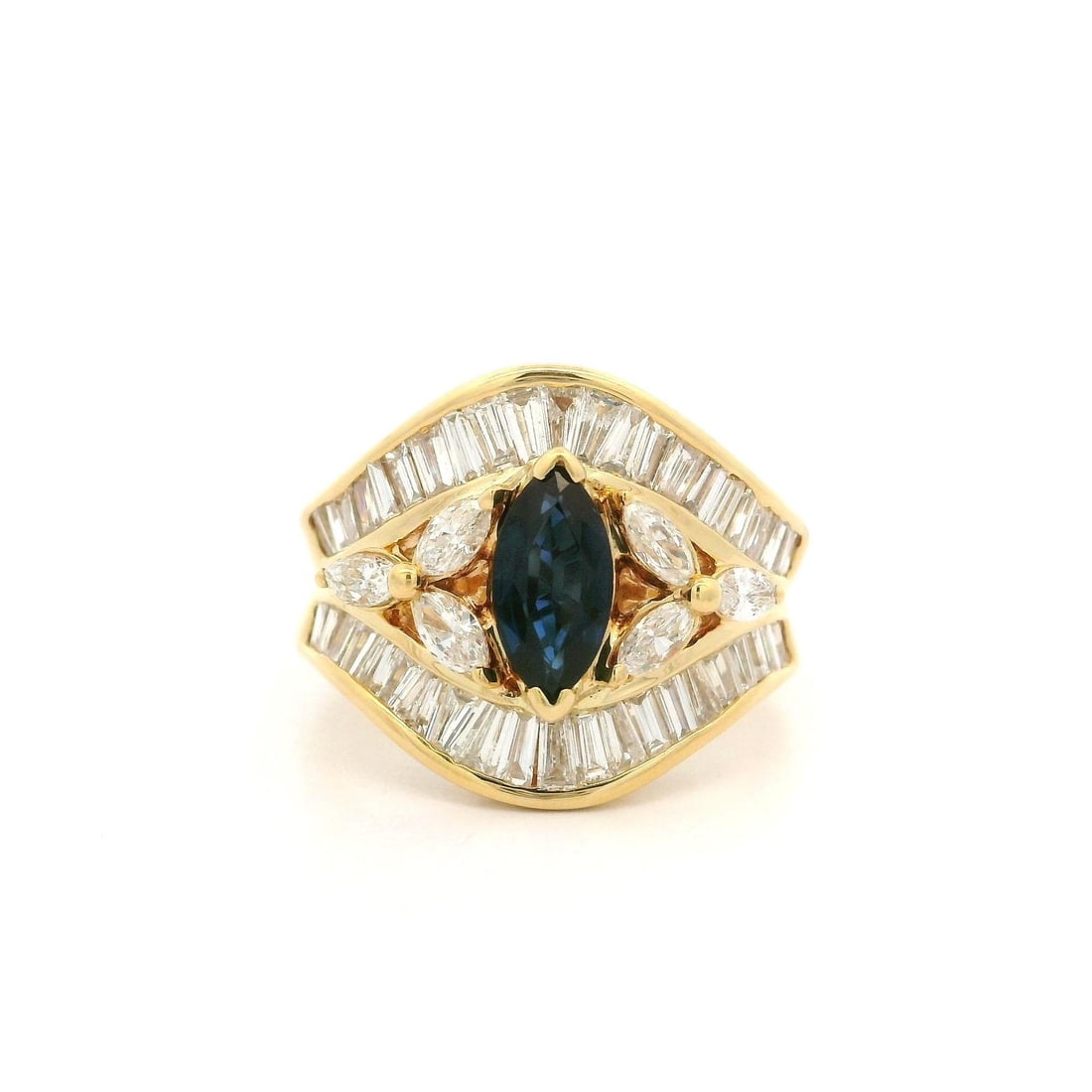 18k Gold 1.98ct Marquise Sapphire Diamond Cocktail Band Ring: 18k Gold 1.98ct Marquise Sapphire Diamond Cocktail Band Ring Elevate your style with this stunning cocktail band ring, featuring a captivating marquise sapphire surrounded by sparkling diamonds. Craft