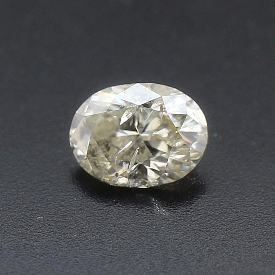 Loose Diamond - OVAL 0.65ct O-P I2: Loose Diamond - OVAL 0.65ct O-P I2 Source: Natural Shape: OVAL Carats: 0.65 Color: O-P Certification: NONE The Diamond Depot Guarantee: All items in this auction are guaranteed to be 100% authentic. A