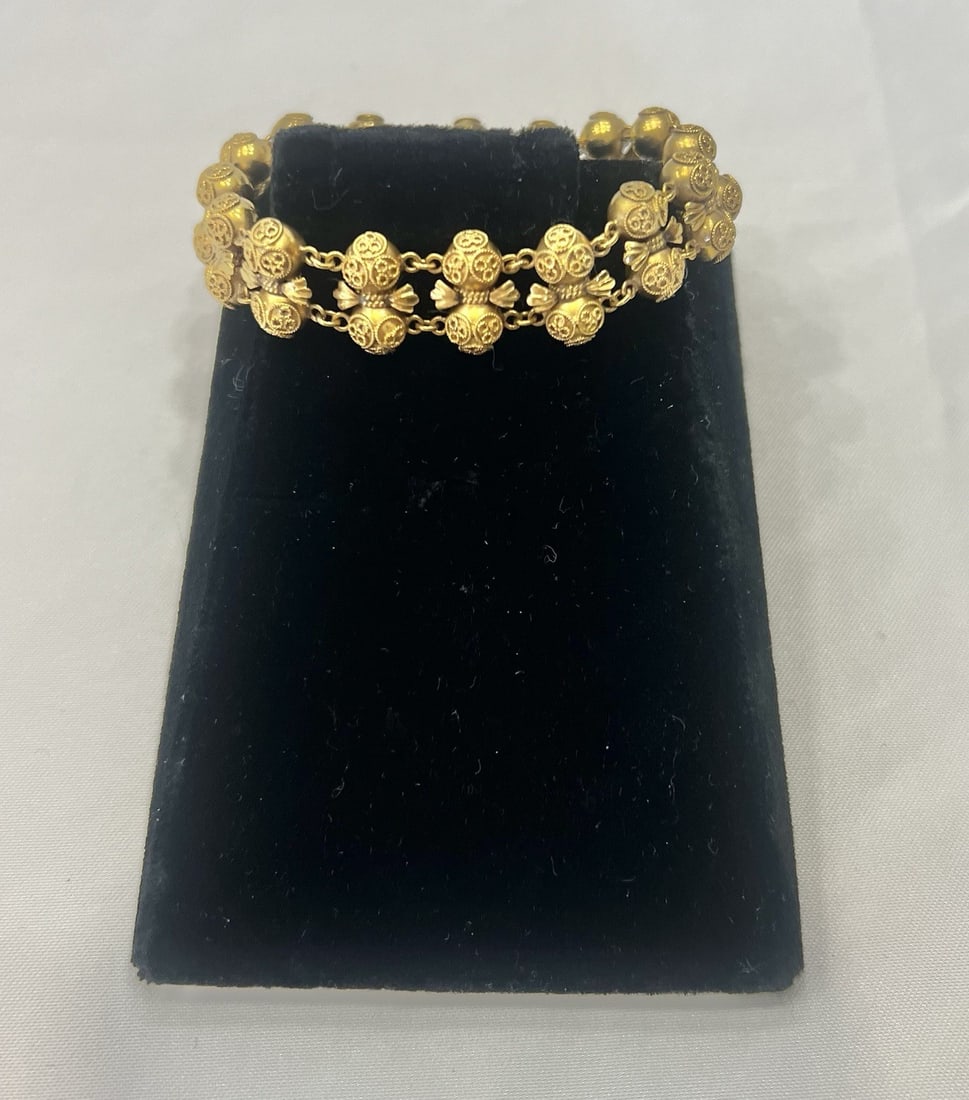 19th Century Italy Etruscan Revival 20K Gold Beaded Bracelet: 19th Century Italy Etruscan Revival 20K Gold Beaded Bracelet This exceptional 19th-century Etruscan Revival bracelet from the Tuscany region of Italy is crafted from high-karat 20k gold. Featuring int