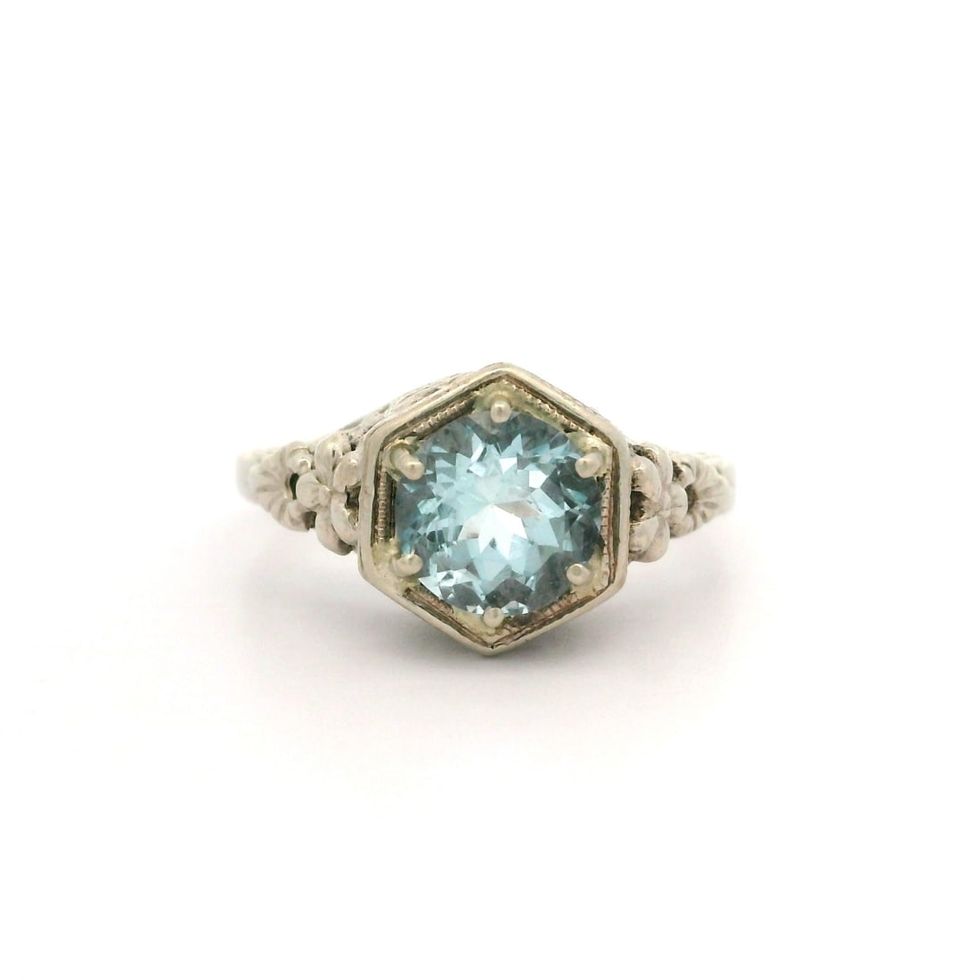 Antique Art Deco 14K White Gold 1.06ct Blue Aquamarine Floral Ring: Antique Art Deco 14K White Gold 1.06ct Blue Aquamarine Floral Ring This exquisite Antique Art Deco ring showcases a stunning 1.06ct natural round aquamarine, prong set in a beautiful floral open work 