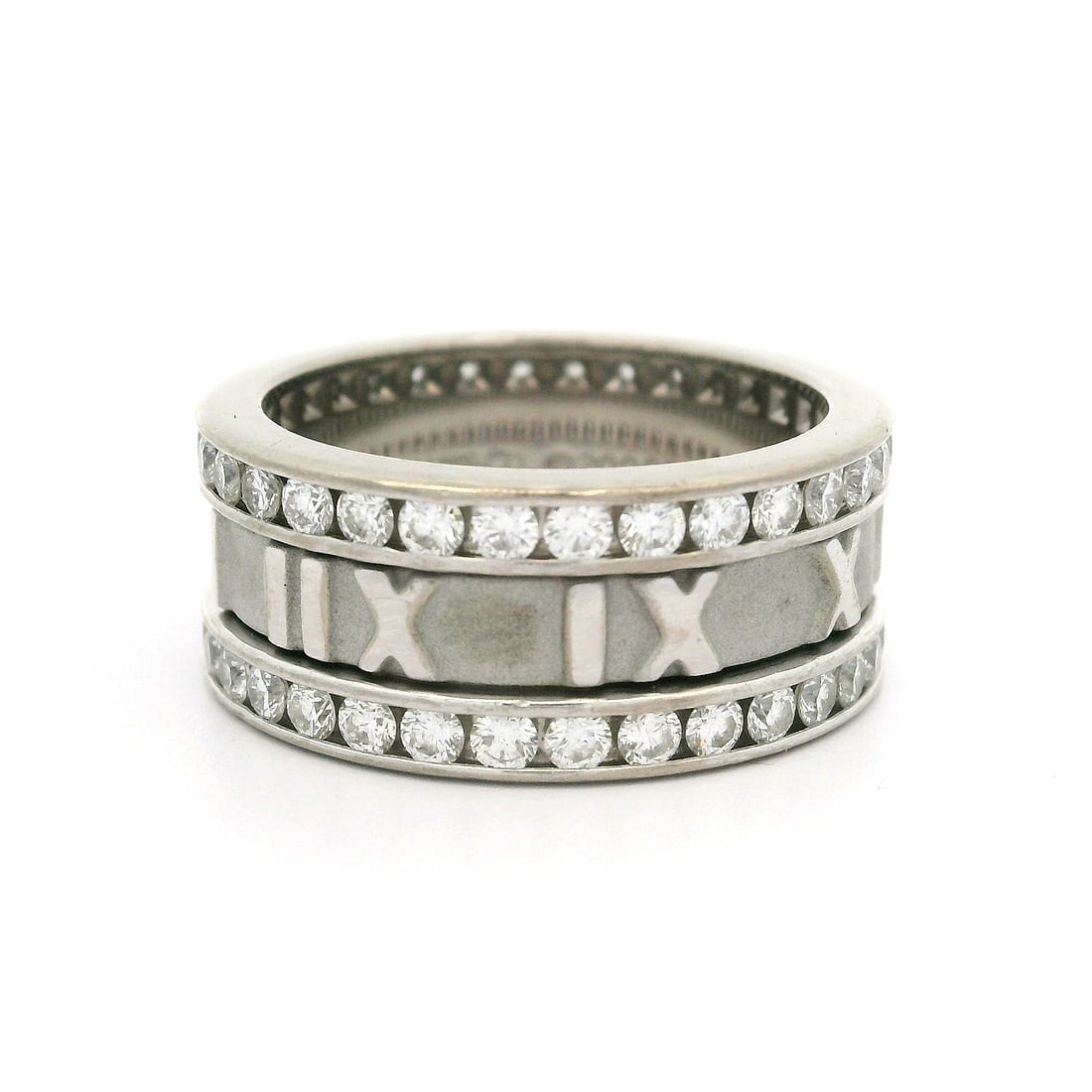 Tiffany & Co. Atlas 18k White Gold Diamond Roman Numeral Ring 1.60ctw: Tiffany & Co. Atlas 18k White Gold Diamond Roman Numeral Ring 1.60ctw This stunning Tiffany & Co. Atlas wide band ring is crafted from luxurious 18k white gold and features a total of 1.60 carats of n