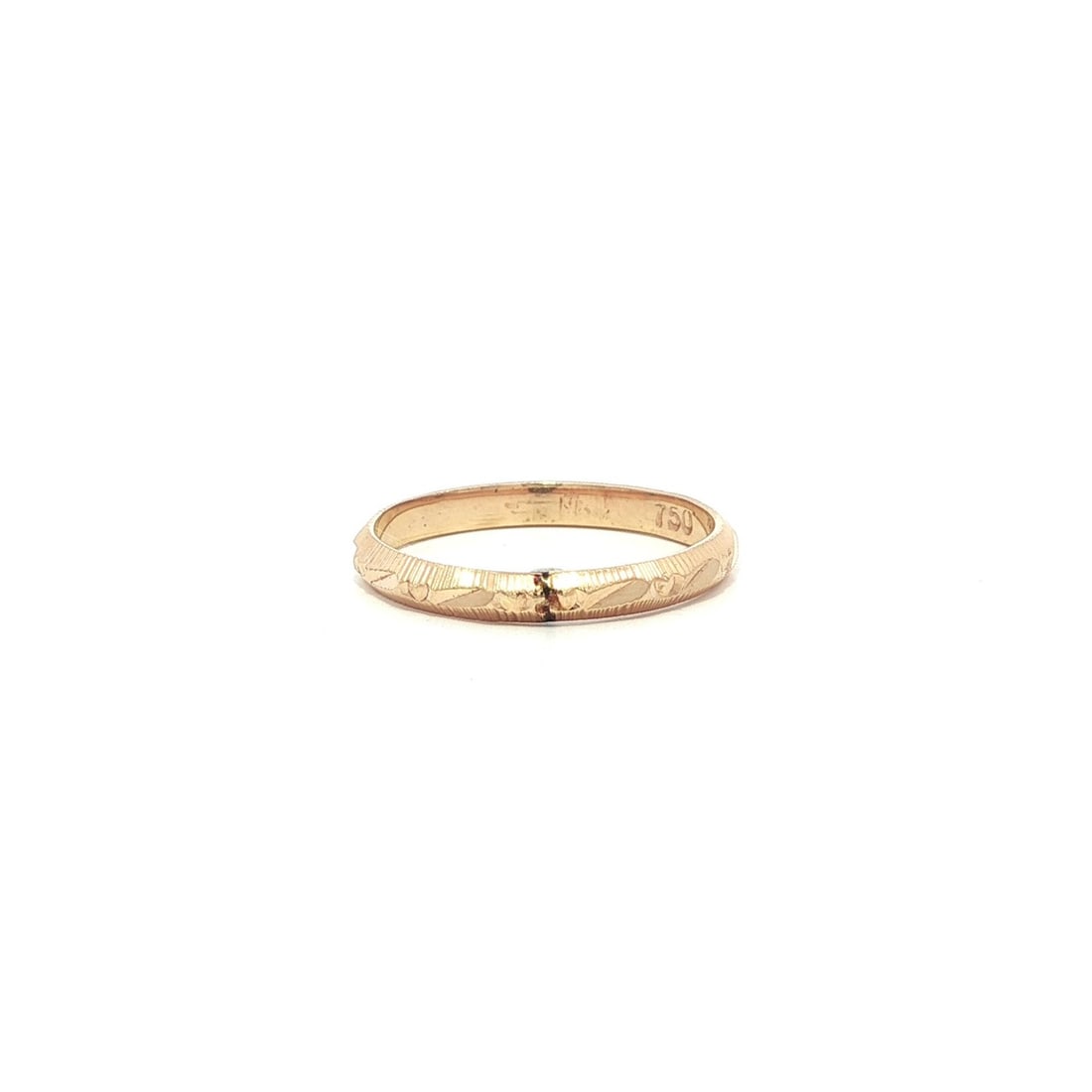 18k Yellow Gold Vintage Diamond Cut Stacking Band Ring Size 4: 18k Yellow Gold Vintage Diamond Cut Stacking Band Ring Size 4 This vintage stackable band ring is crafted from solid 18k yellow gold and features a diamond-cut design. The ring is a size 4 and is not 