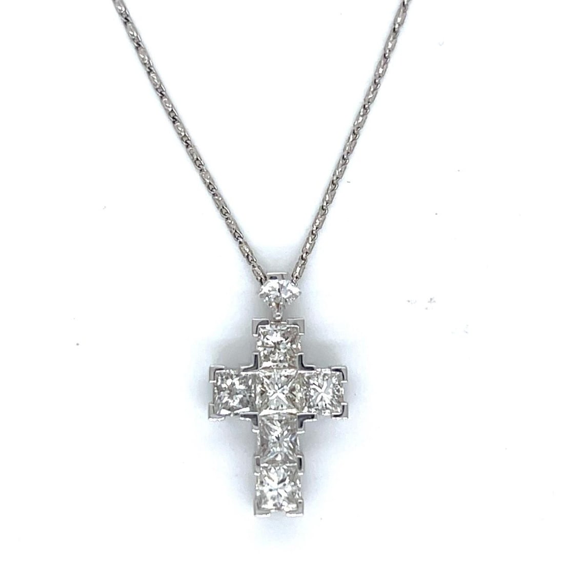 Diamond Cross Pendant 2.36 Ct in 18K White Gold on 14K White Gold Chain: Diamond Cross Pendant 2.36 Ct in 18K White Gold on 14K White Gold Chain This elegant necklace features a cross pendant crafted from 18K white gold, set with seven diamonds totaling 2.36 carats in G-H 