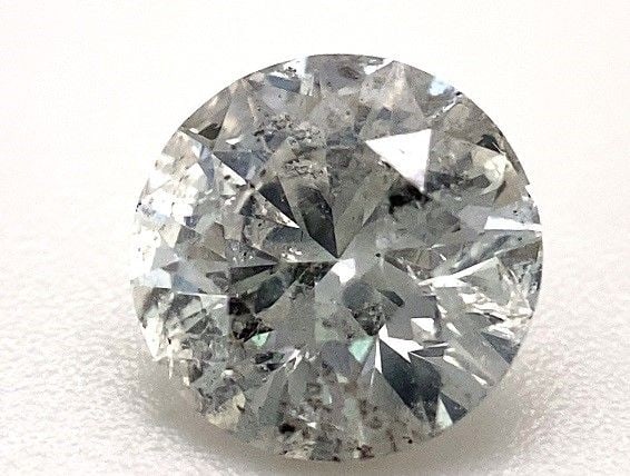 Loose Diamond - ROUND 0.97ct F I2: Loose Diamond - ROUND 0.97ct F I2 Source: Natural Shape: ROUND Carats: 0.97 Color: F Clarity: I2 Certification: OTHER The Diamond Depot Guarantee: All items in this auction are guaranteed to be 100% a