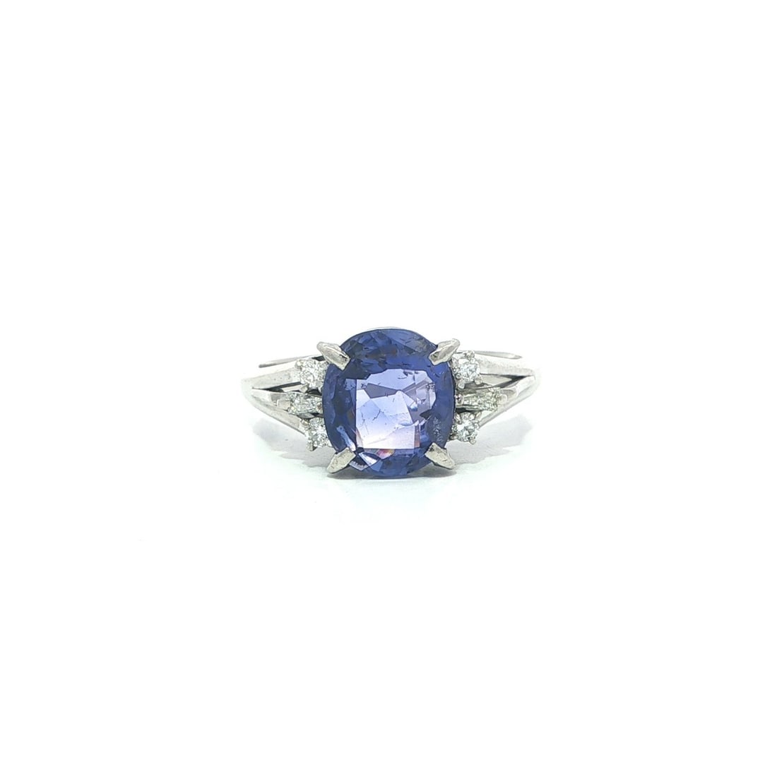 GIA Certified Platinum Ring With No Heat Color Change Sapphire and Diamonds: GIA Certified Platinum Ring With No Heat Color Change Sapphire and Diamonds This platinum cocktail ring features a GIA-certified natural sapphire that displays a remarkable color change from violetish