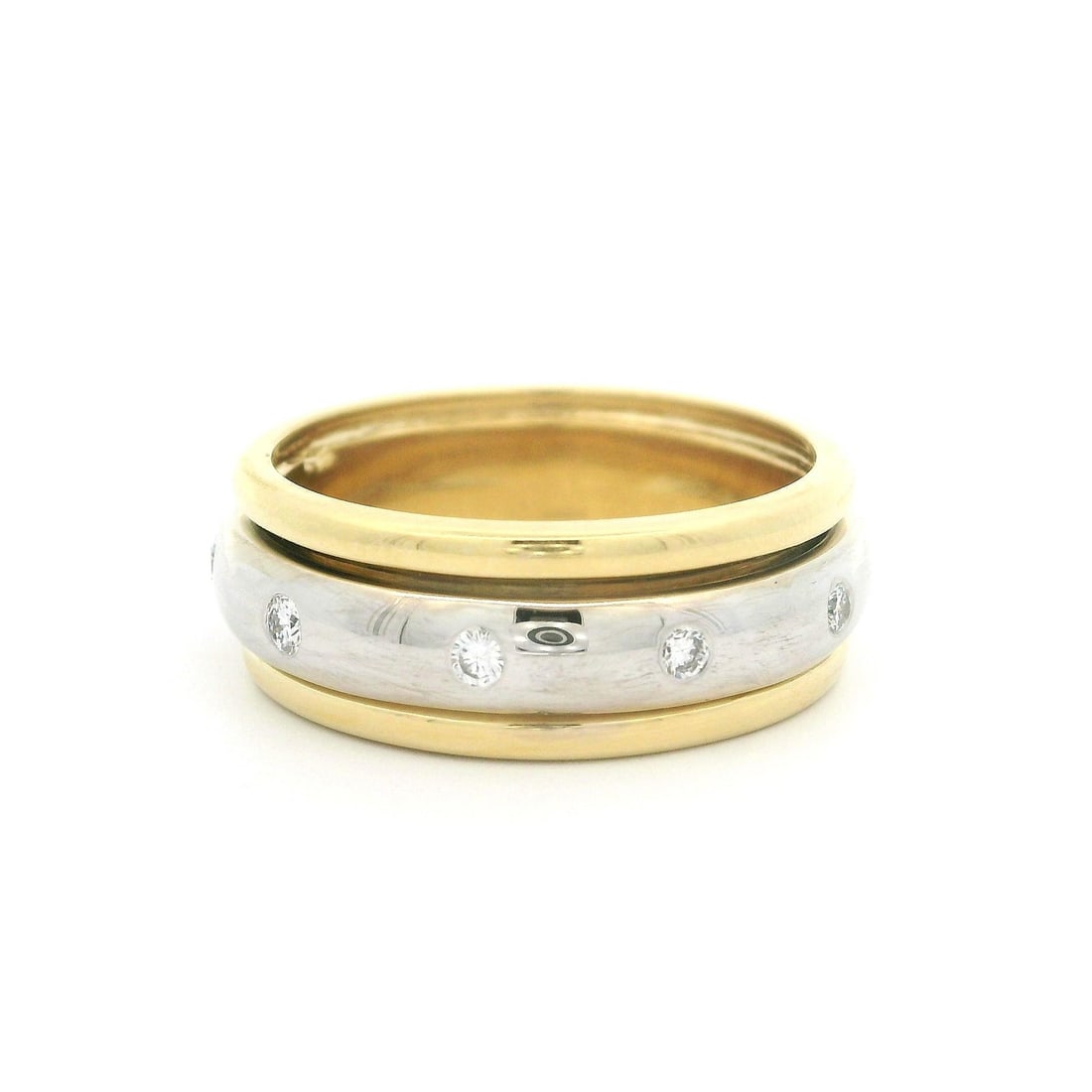 18K Yellow White Gold 0.25ct Diamond Spinning Band Ring 7.3mm: 18K Yellow White Gold 0.25ct Diamond Spinning Band Ring 7.3mm This stunning 18k yellow and white gold band ring features a unique spinning center design adorned with ten natural genuine diamonds. The 