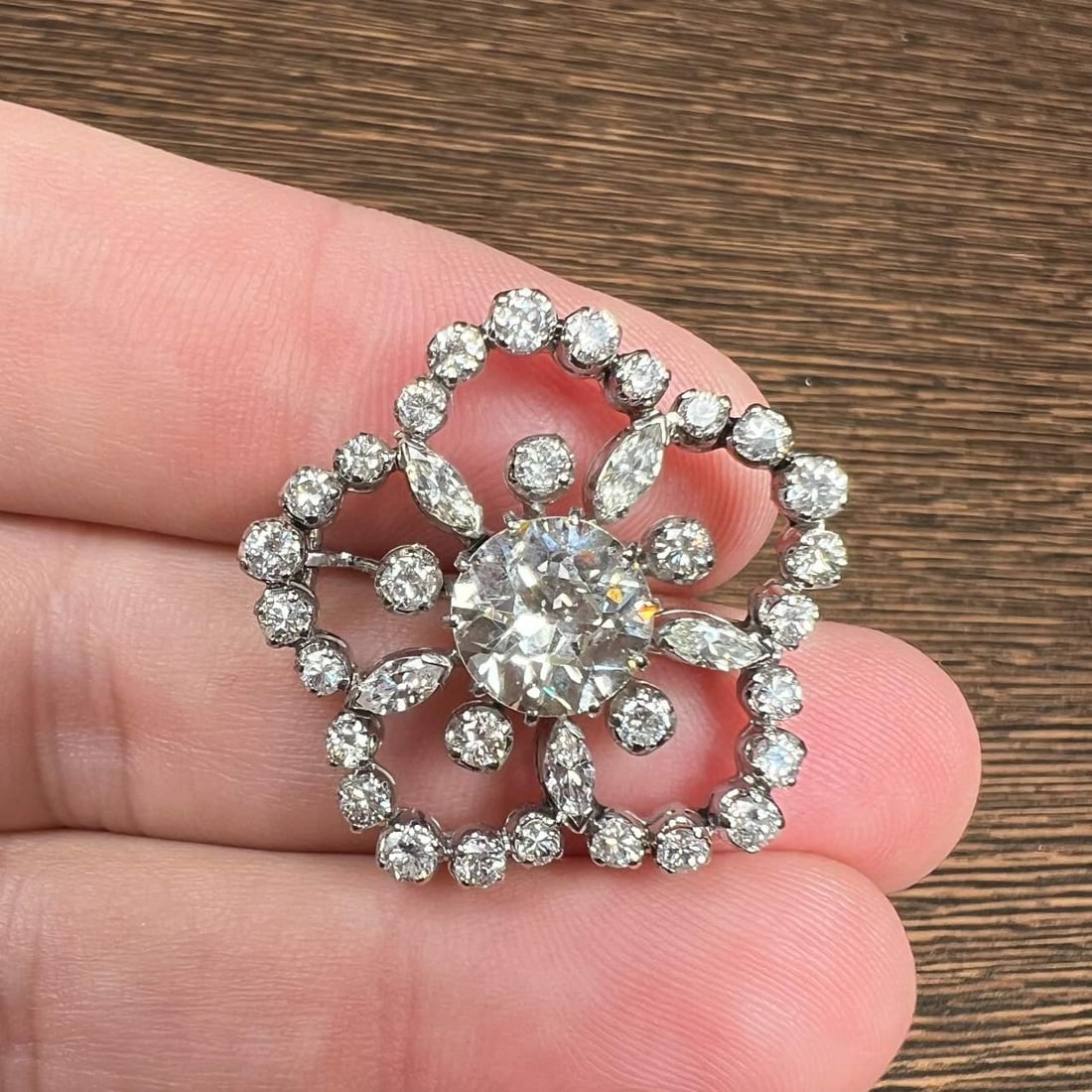 Art Deco 18K White Gold 4.85 Ct. Diamond Brooch with Center 2.25 Ct. Diamond: Art Deco 18K White Gold 4.85 Ct. Diamond Brooch with Center 2.25 Ct. Diamond This exquisite Art Deco brooch is crafted from 18K white gold and features a stunning array of diamonds totaling approximat