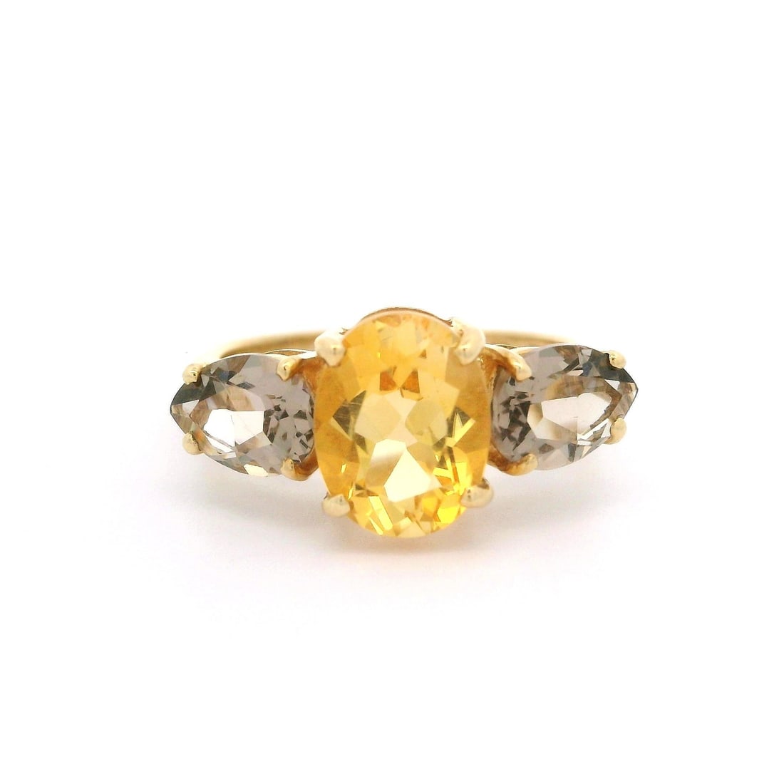 10k Yellow Gold Cocktail Ring with Oval Citrine and Smoky Quartz: 10k Yellow Gold Cocktail Ring with Oval Citrine and Smoky Quartz This stunning cocktail ring showcases a beautiful natural genuine oval citrine at its center, featuring a brilliant cut and prong set i