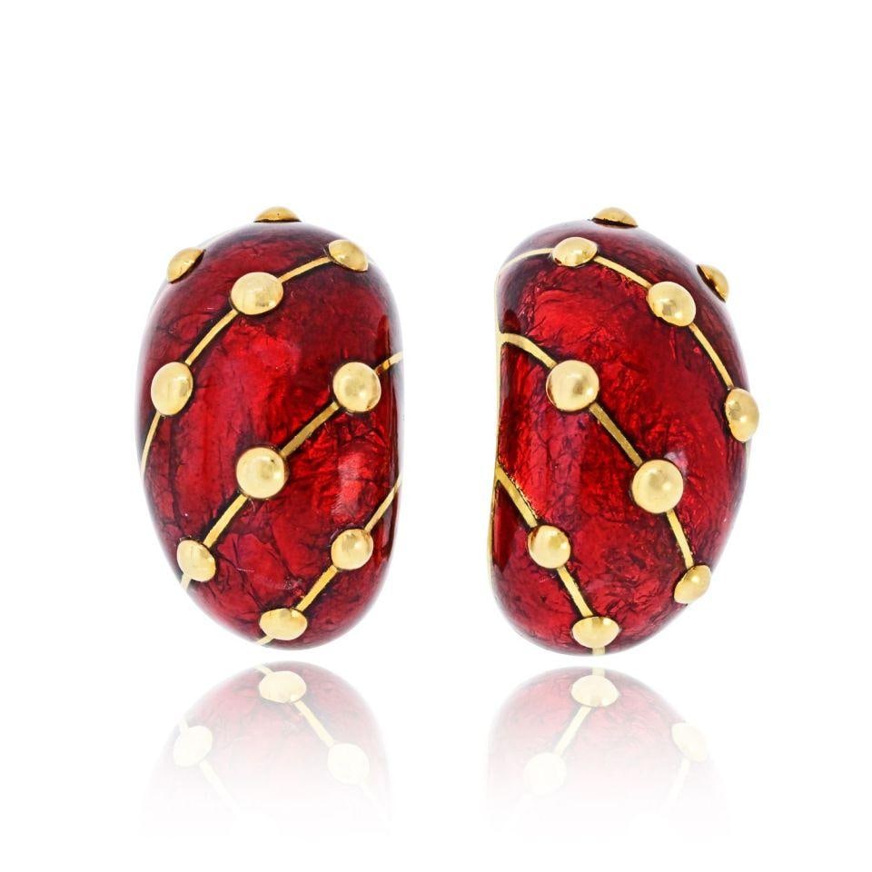 Schlumberger Earrings in 18K Gold with Red Enamel and Diamonds by Tiffany & Co.: Schlumberger Earrings in 18K Gold with Red Enamel and Diamonds by Tiffany & Co. Tiffany & Co. Schlumberger Banana earrings are crafted in 18K yellow gold, featuring a distinctive curved silhouette acc