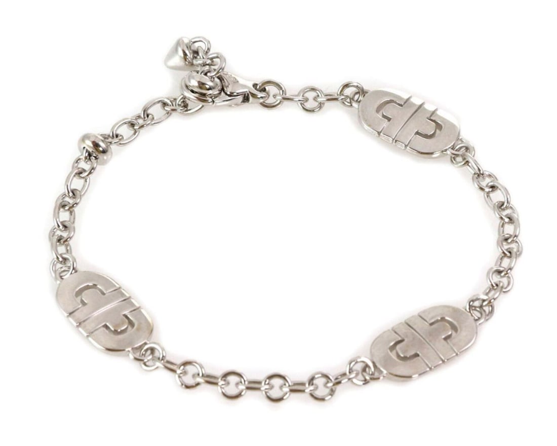 Bvlgari Parentesi link bracelet in 18k white gold with 3 charms: Bvlgari Parentesi link bracelet in 18k white gold with 3 charms A pre-owned Bvlgari Parentesi bracelet in a sleek link style, crafted in 18k white gold and accented with three Parentesi charms. It is 
