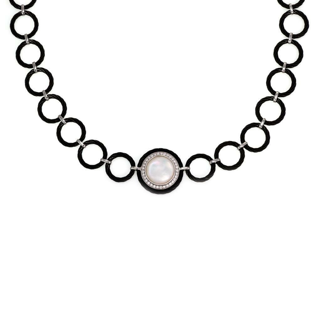 Charriol 18k White Gold and Steel Necklace With Diamond Mother of Pearl Pendant: Charriol 18k White Gold and Steel Necklace With Diamond Mother of Pearl Pendant This Charriol necklace features a ring link design crafted from 18k white gold and black stainless steel. The centerpiec