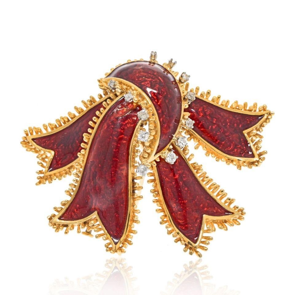 David Webb Platinum 18K Yellow Gold Red Enamel Ribbon Brooch: David Webb Platinum 18K Yellow Gold Red Enamel Ribbon Brooch This exquisite brooch showcases the artistry of David Webb, crafted from a combination of platinum and 18K yellow gold, weighing 40.2 grams