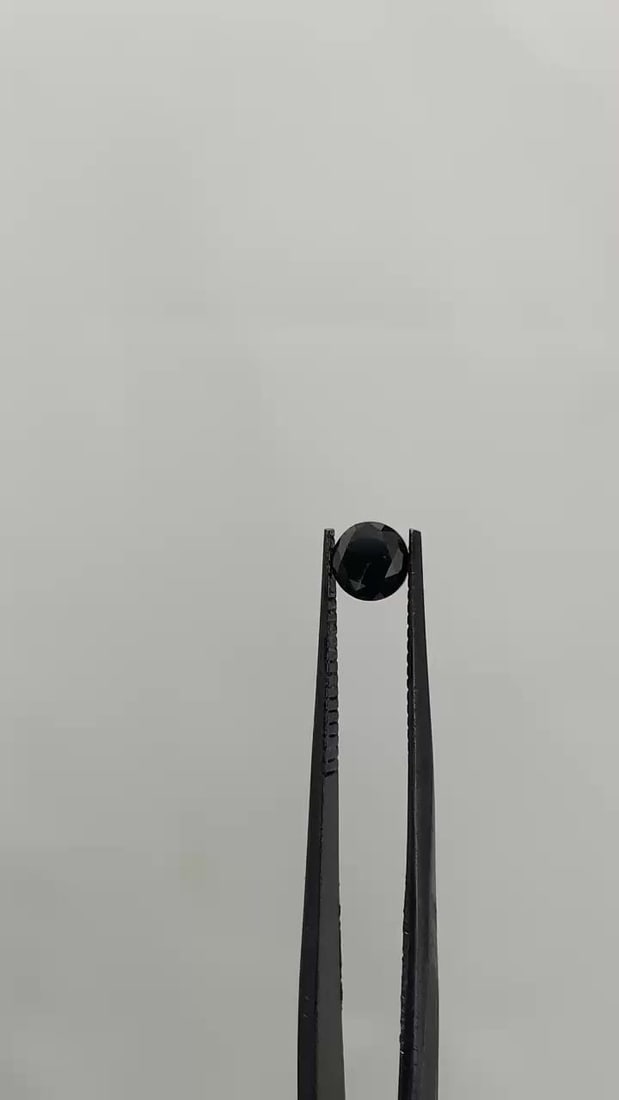 Loose Diamond - ROUND 0.69ct Fancy Black VVS2: Loose Diamond - ROUND 0.69ct Fancy Black VVS2 Source: Natural Shape: ROUND Carats: 0.69 Color: Fancy Black Certification: GIA Video: