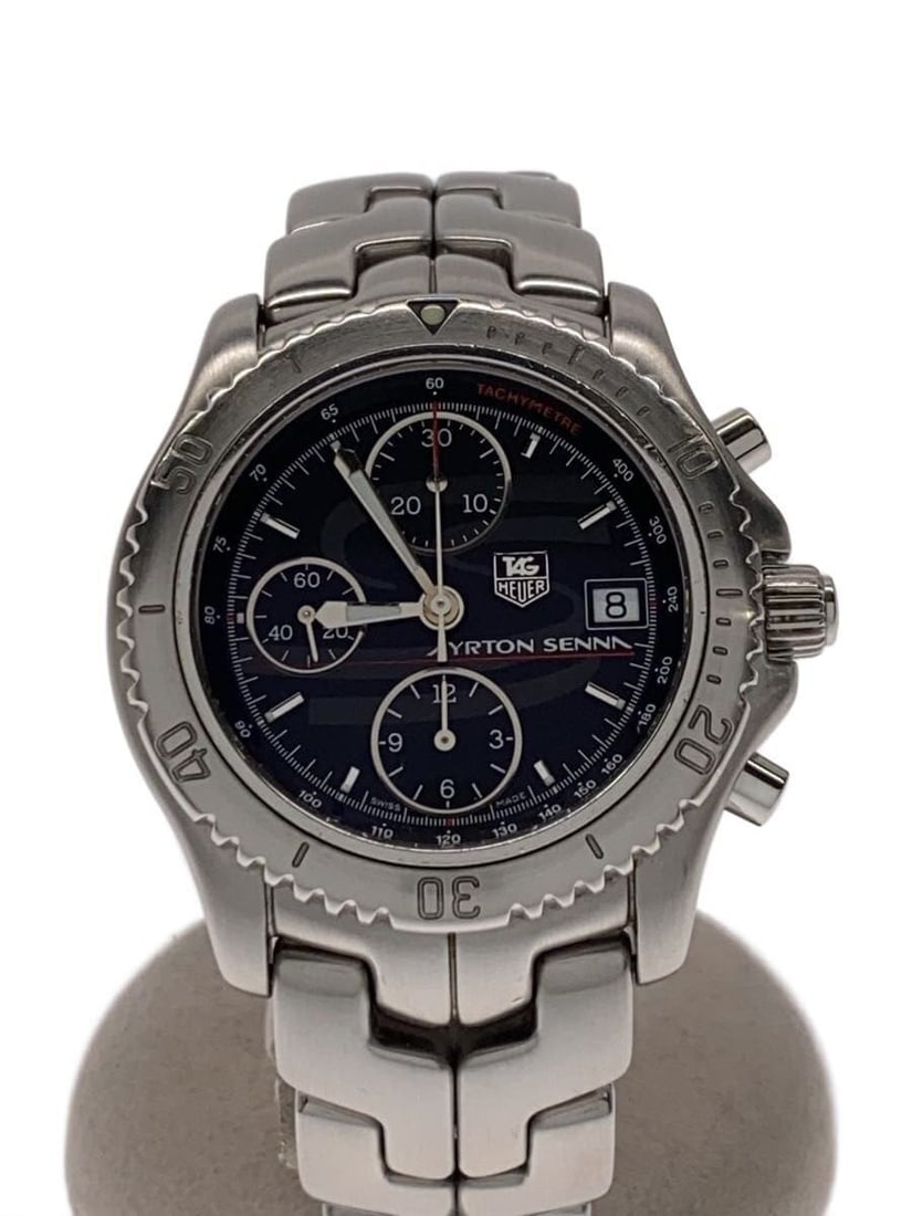 TAG Heuer Senna Limited Edition Link Men's Stainless Steel Watch CT2114: TAG Heuer Senna Limited Edition Link Men's Stainless Steel Watch CT2114 This TAG Heuer Link Ayrton Senna Limited Edition men's wristwatch is a tribute to the legendary Formula 1 driver. Crafted in Swi