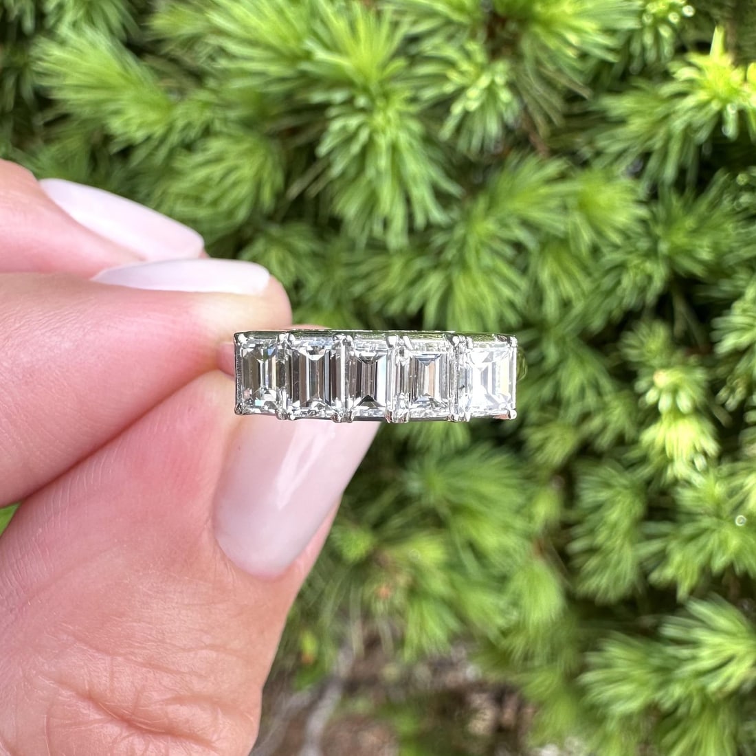 Platinum Band With Five Rectangular Step Cut Diamonds 1.11ctw Vintage Ring Size 6: Platinum Band With Five Rectangular Step Cut Diamonds 1.11ctw Vintage Ring Size 6 This vintage wedding band ring features five natural, rectangular step cut diamonds with a total carat weight of 1.11.