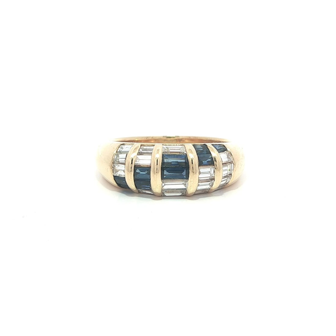 Domed Band Ring in 18k Yellow Gold with Diamonds and Sapphires Baguette Set: Domed Band Ring in 18k Yellow Gold with Diamonds and Sapphires Baguette Set This domed band ring is crafted from solid 18k yellow gold and features a channel set design with straight baguette cut natu