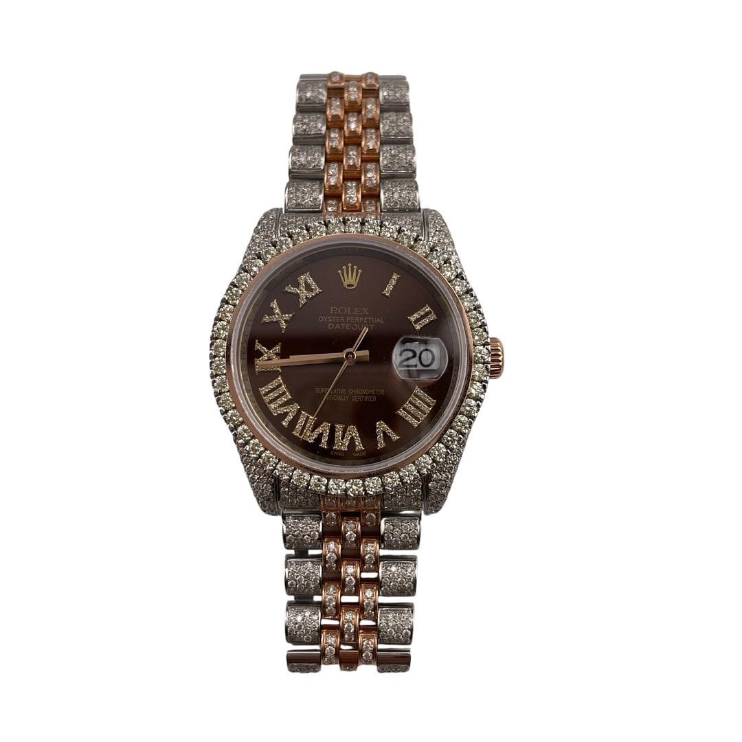 Rolex Datejust 116201 Chocolate Roman Dial Diamond Bezel Jubilee Bracelet: Rolex Datejust 116201 Chocolate Roman Dial Diamond Bezel Jubilee Bracelet This men's Rolex Datejust features a chocolate Roman dial and a diamond bezel, complemented by a Jubilee bracelet. The watch i