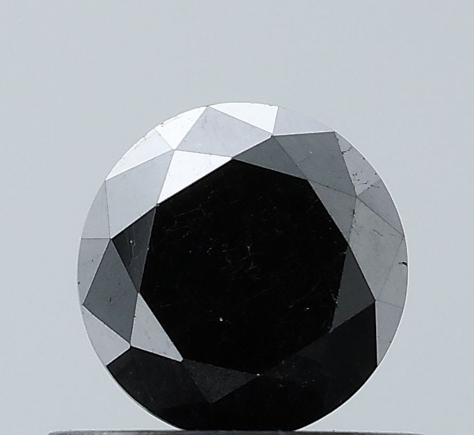 Loose Diamond - ROUND 0.74ct Fancy Black VVS2: Loose Diamond - ROUND 0.74ct Fancy Black VVS2 Source: Natural Shape: ROUND Carats: 0.74 Color: Fancy Black Certification: NONE Video: