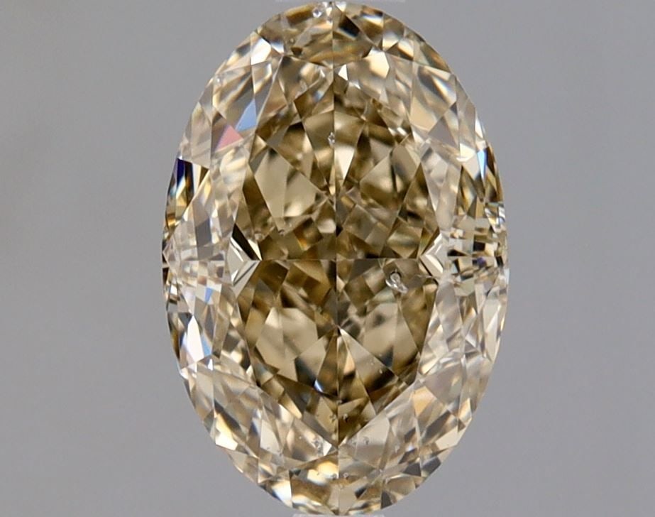 Loose Diamond - OVAL 1.02ct Fancy Yellow Brown SI2: Loose Diamond - OVAL 1.02ct Fancy Yellow Brown SI2 Source: Natural Shape: OVAL Carats: 1.02 Color: Fancy Yellow Brown Certification: GIA Video: