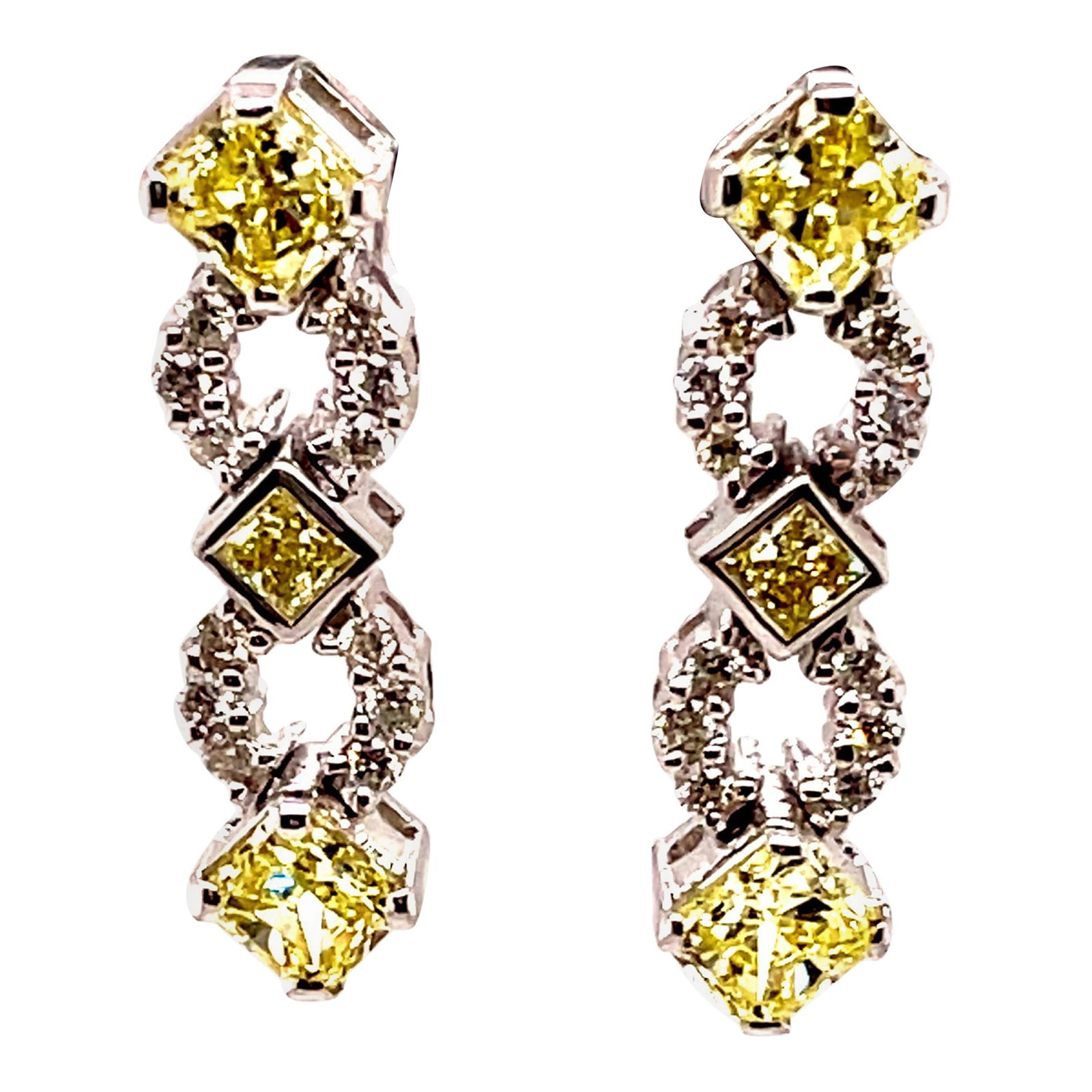Stunning 2.60ct Yellow Diamond Earrings in 18k White Gold: Stunning 2.60ct Yellow Diamond Earrings in 18k White Gold These exquisite earrings feature stunning yellow diamonds set in luxurious 18k white gold. Showcasing a total diamond weight of 2.60 carats, t