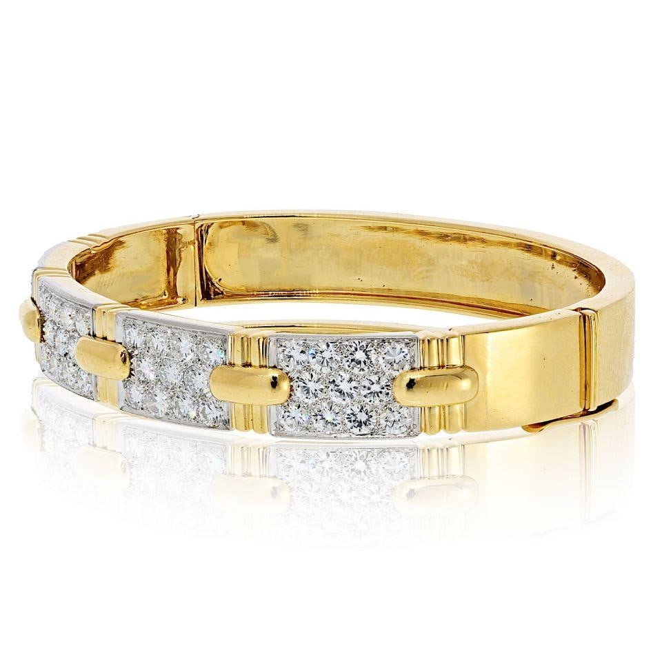 Platinum and 18K Gold Diamond Bangle by David Webb Stitch Collection: Platinum and 18K Gold Diamond Bangle by David Webb Stitch Collection This David Webb bangle bracelet features a sophisticated stitch design crafted in platinum and 18K yellow gold, adorned with round 