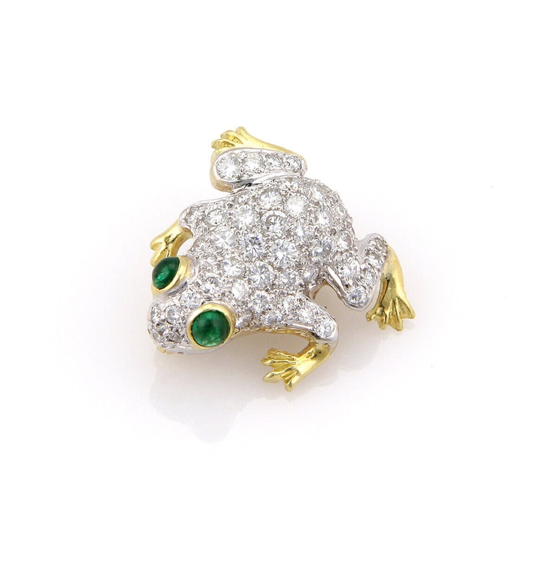 18k Yellow White Gold Frog Brooch with Diamonds and Emeralds: 18k Yellow White Gold Frog Brooch with Diamonds and Emeralds This vintage estate frog brooch is crafted in 18k yellow and white gold and features diamond and emerald accents. The piece is described as