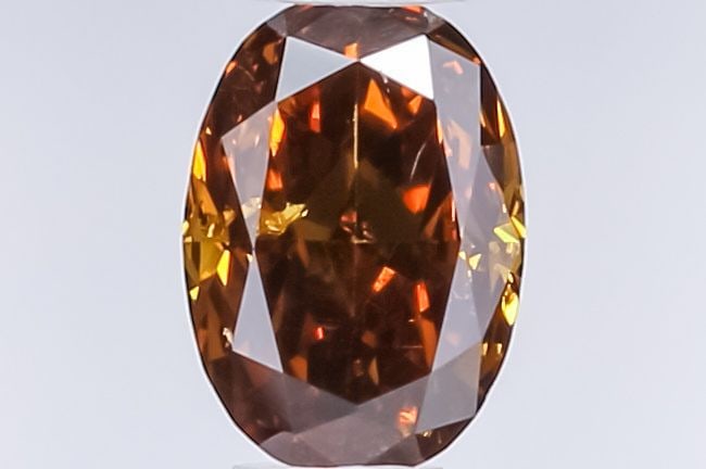 Loose Diamond - OVAL 0.4ct Fancy Dark Yellowish Brown: Loose Diamond - OVAL 0.4ct Fancy Dark Yellowish Brown Source: Natural Shape: OVAL Carats: 0.4 Color: Fancy Dark Yellowish Brown Certification: GIA Video: