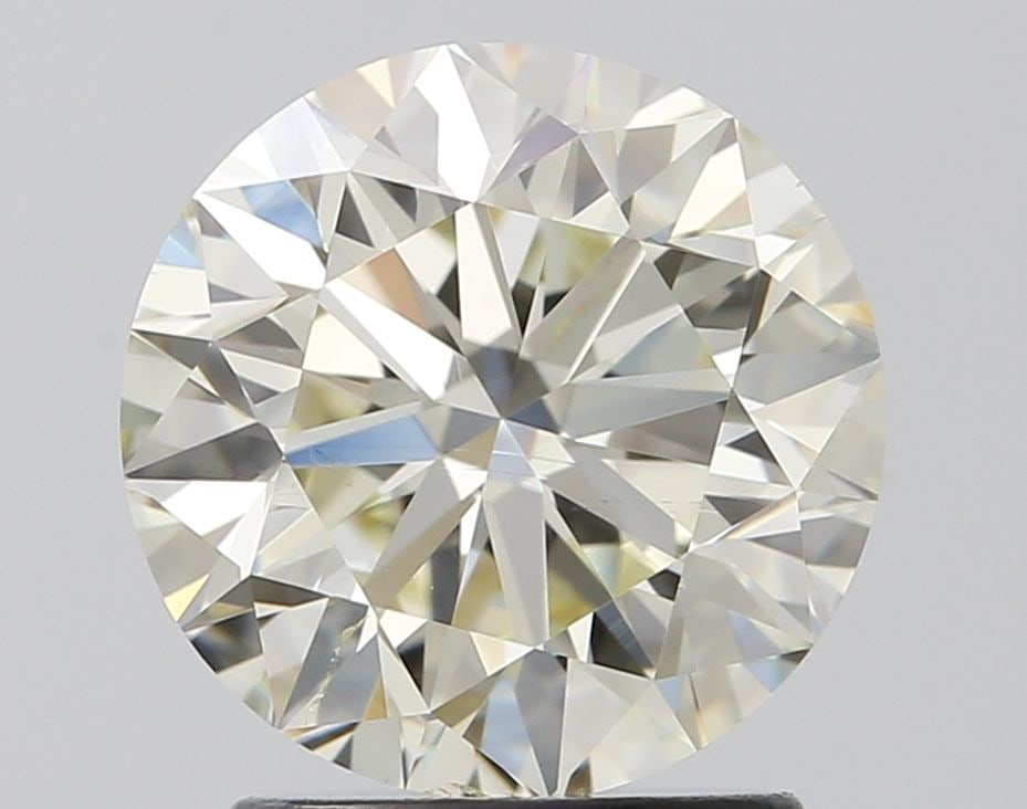 Loose Diamond - ROUND 2.01ct J SI1: Loose Diamond - ROUND 2.01ct J SI1 Source: Natural Shape: ROUND Carats: 2.01 Color: J Clarity: SI1 Certification: IGI Video:
