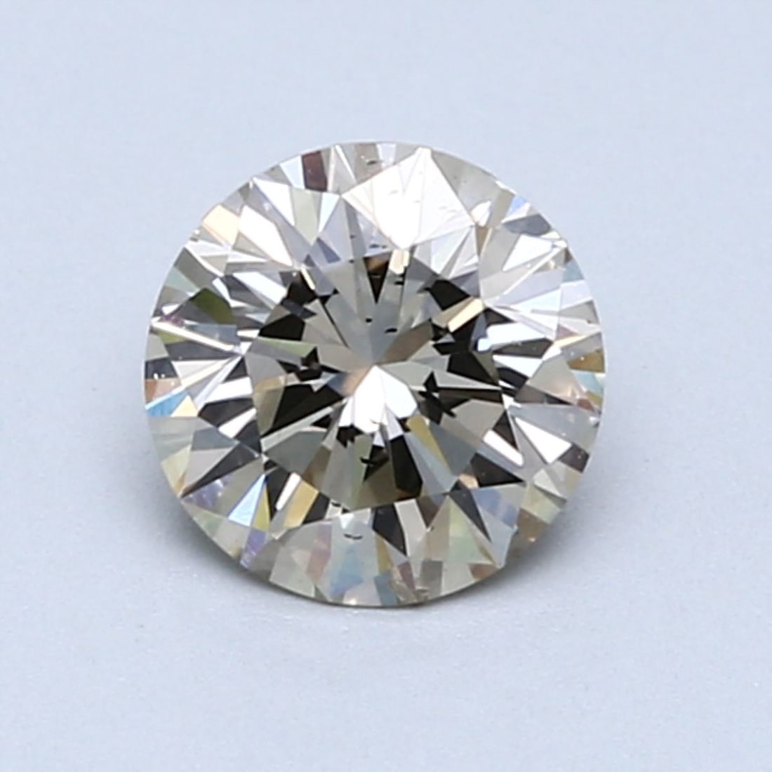 Loose Diamond - ROUND 1.03ct O-P SI1: Loose Diamond - ROUND 1.03ct O-P SI1 Source: Natural Shape: ROUND Carats: 1.03 Color: O-P Certification: GIA Video: