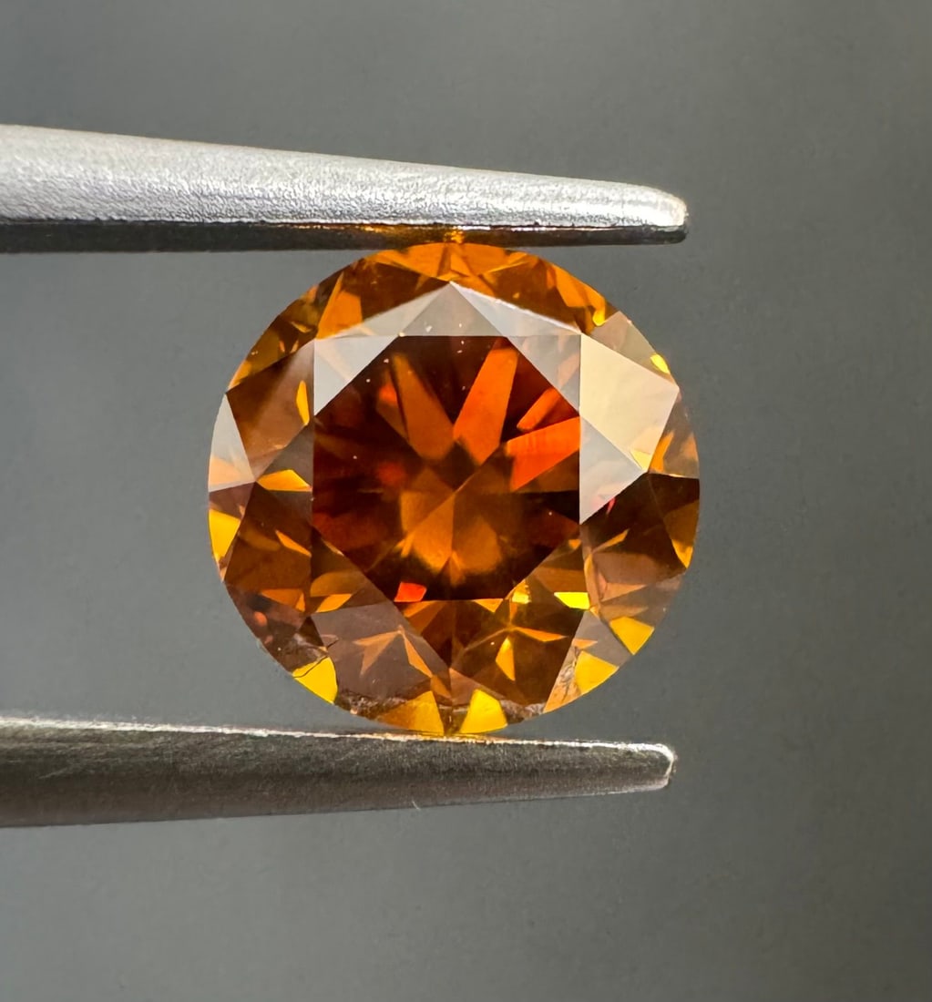 Loose Diamond - ROUND 0.68ct Fancy Deep Yellowish Orange I1: Loose Diamond - ROUND 0.68ct Fancy Deep Yellowish Orange I1 Source: Natural Shape: ROUND Carats: 0.68 Color: Fancy Deep Yellowish Orange Certification: GIA The Diamond Depot Guarantee: All items in th
