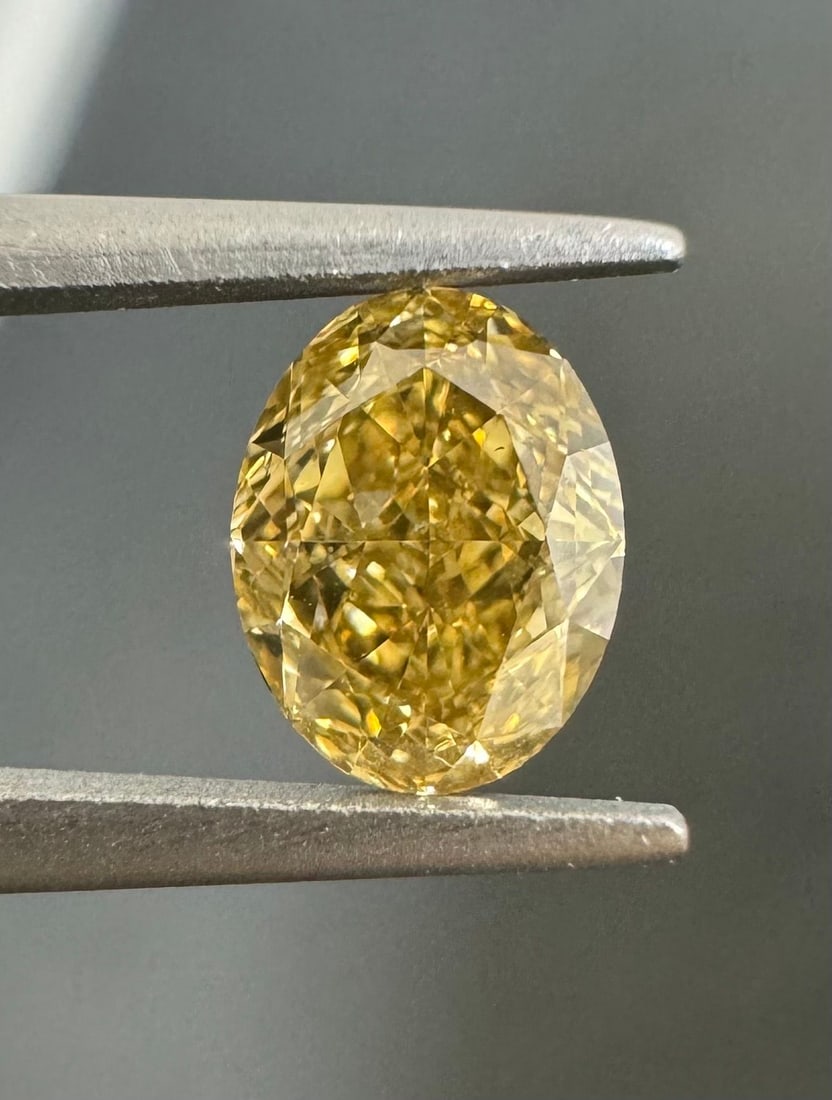 Loose Diamond - OVAL 0.71ct Fancy Yellow Brown VS2: Loose Diamond - OVAL 0.71ct Fancy Yellow Brown VS2 Source: Natural Shape: OVAL Carats: 0.71 Color: Fancy Yellow Brown Certification: GIA Video: