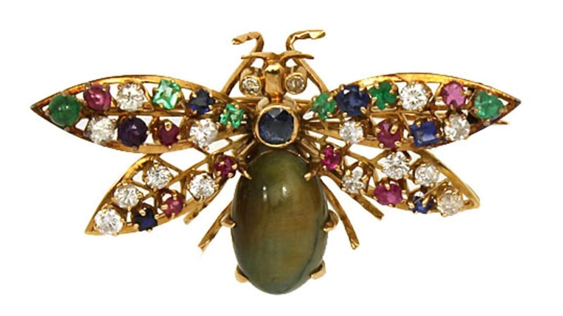 Vintage 14K Yellow Gold Winged Bug Brooch with Jade and Mixed Gemstones: Vintage 14K Yellow Gold Winged Bug Brooch with Jade and Mixed Gemstones A vintage estate winged bug gemstone brooch crafted in 14k yellow gold. The design features diamonds, sapphires, emeralds, rubie