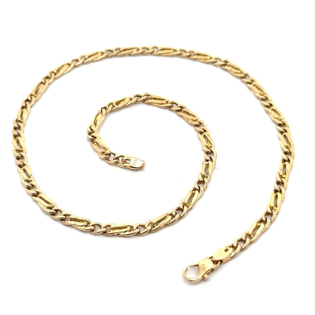 16 Inch 14k Yellow Gold Puffed Figaro Chain Necklace with Lobster Clasp: 16 Inch 14k Yellow Gold Puffed Figaro Chain Necklace with Lobster Clasp This unisex necklace features a 16-inch puffed Figaro link chain crafted from solid 14k yellow gold. It is secured with a lobste