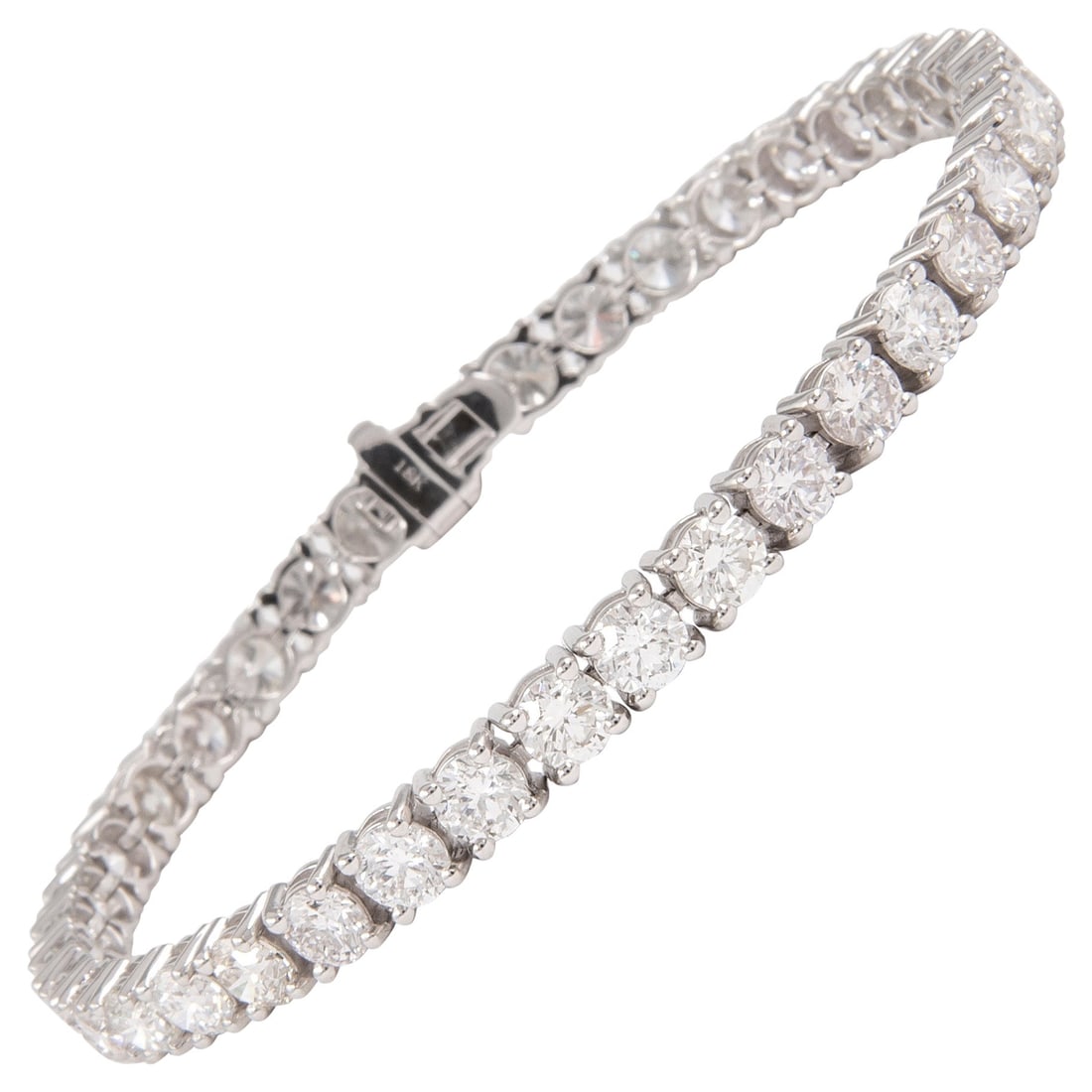 12.06ct Diamond Tennis Bracelet 18k White Gold: 12.06ct Diamond Tennis Bracelet 18k White Gold This stunning diamond tennis bracelet features 38 round brilliant diamonds totaling 12.06 carats, with an average diamond weight of 0.31 ct. Crafted from