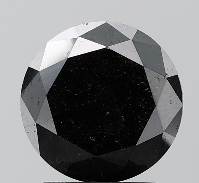 Loose Diamond - ROUND 2.91ct Fancy Black VVS2: Loose Diamond - ROUND 2.91ct Fancy Black VVS2 Source: Natural Shape: ROUND Carats: 2.91 Color: Fancy Black Certification: NONE Video: