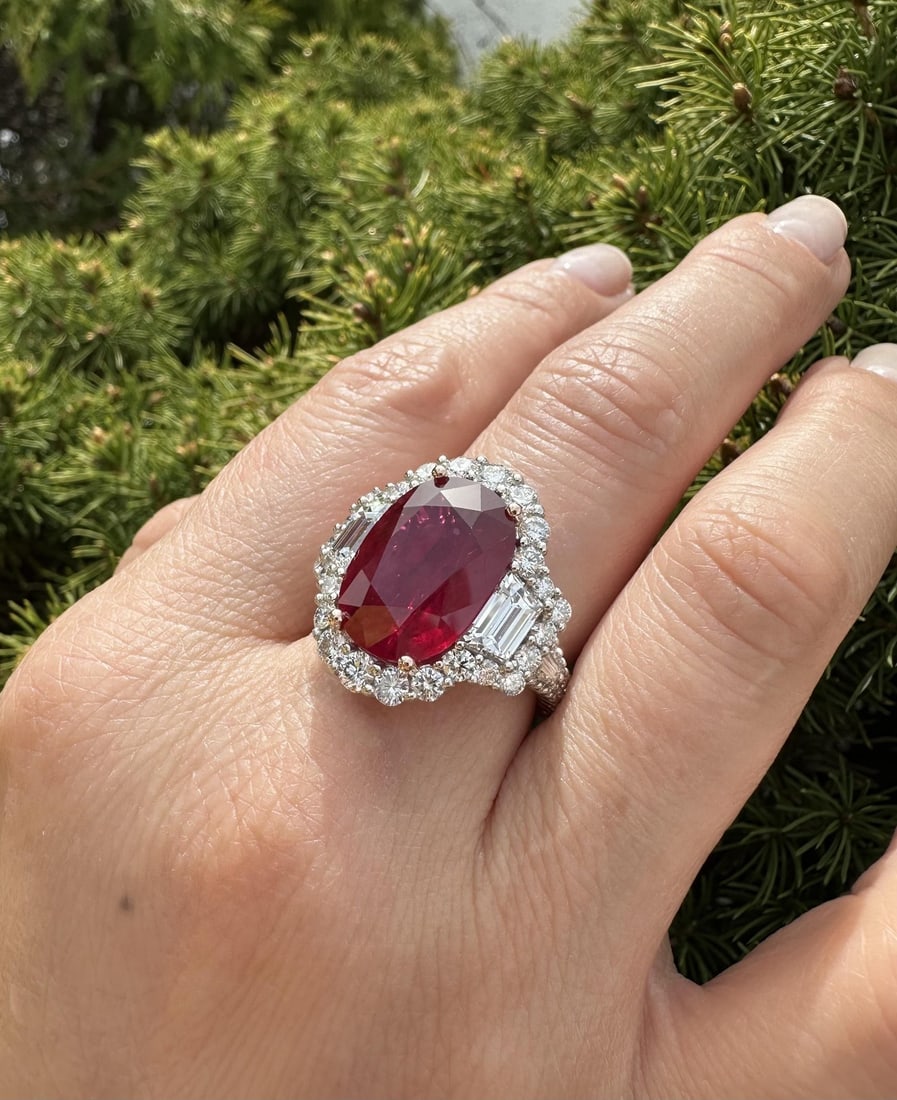 14k Rose Gold AGL Certified 12.25ct Red Ruby Diamond Ring: 14k Rose Gold AGL Certified 12.25ct Red Ruby Diamond Ring This exquisite cocktail ring features a substantial AGL certified 12.25ctw oval red ruby, prong set in solid .900 platinum with 14k rose gold 