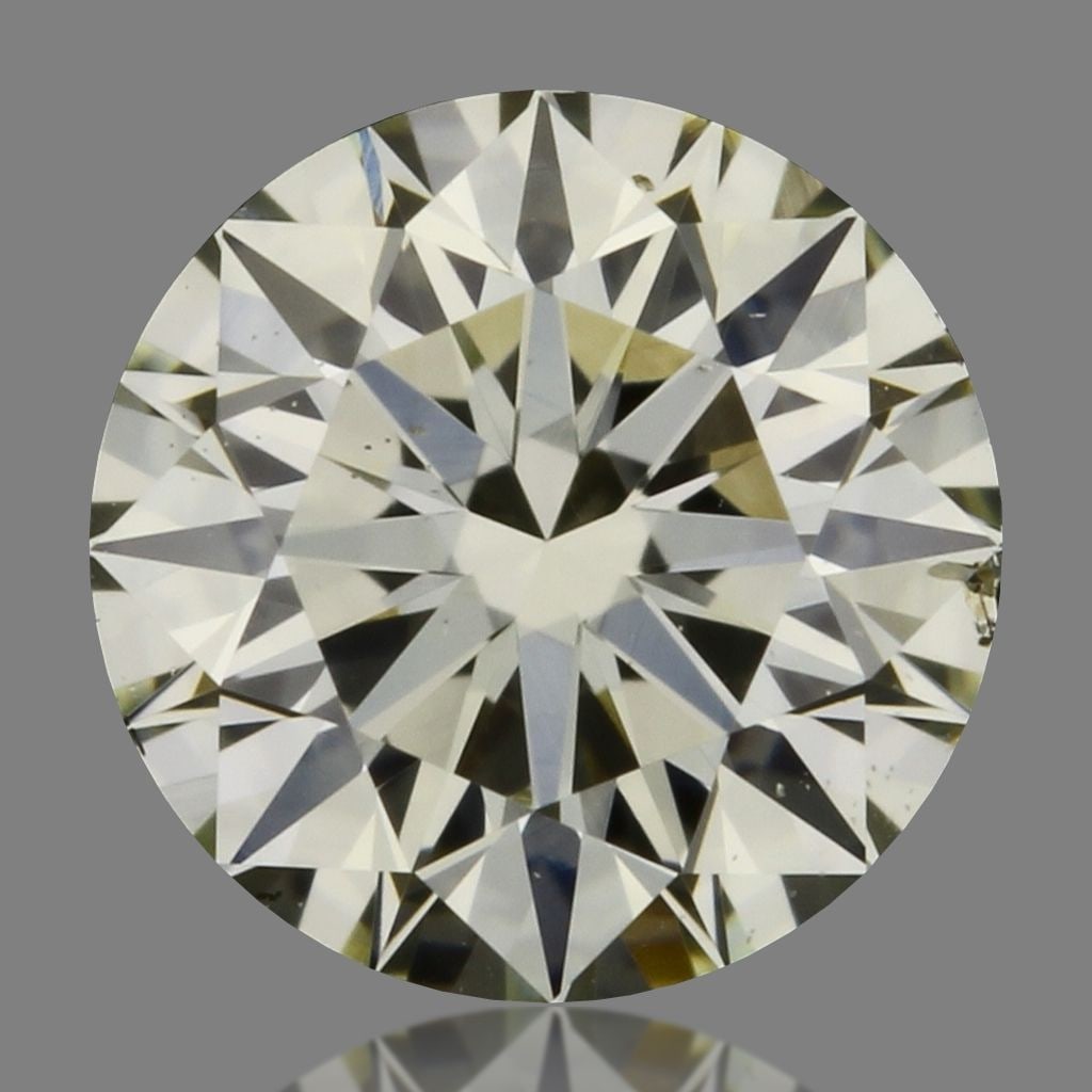 Loose Diamond - ROUND 0.31ct O-P SI1: Loose Diamond - ROUND 0.31ct O-P SI1 Source: Natural Shape: ROUND Carats: 0.31 Color: O-P Certification: IGI Video: