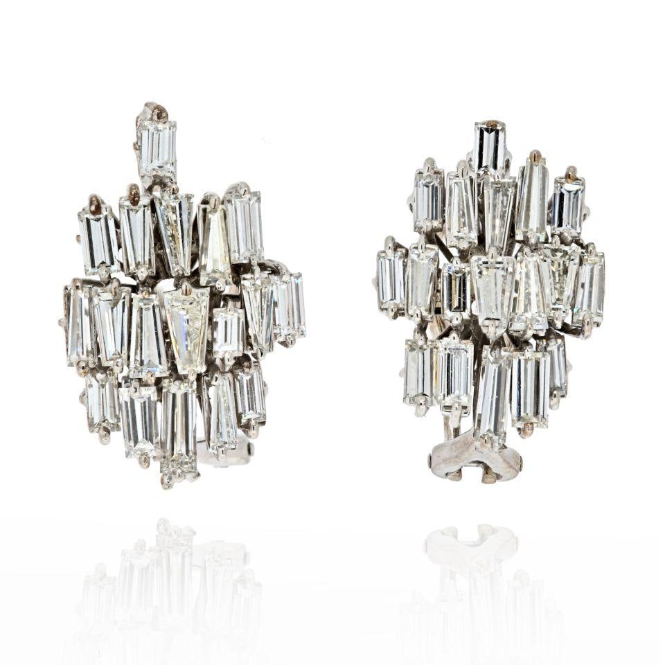 1960s Vintage Platinum Baguette Diamond Earrings 7 Carats: 1960s Vintage Platinum Baguette Diamond Earrings 7 Carats Experience the elegance of vintage jewelry with these exquisite platinum earrings from the 1960s. Adorned with stunning baguette cut diamonds,