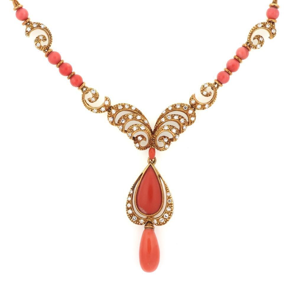 Vintage 18k Gold Coral Diamond Pendant Necklace 90 Points: Vintage 18k Gold Coral Diamond Pendant Necklace 90 Points This exquisite vintage necklace showcases a beautiful design crafted from 18k yellow gold, featuring a textured finish. The centerpiece boasts