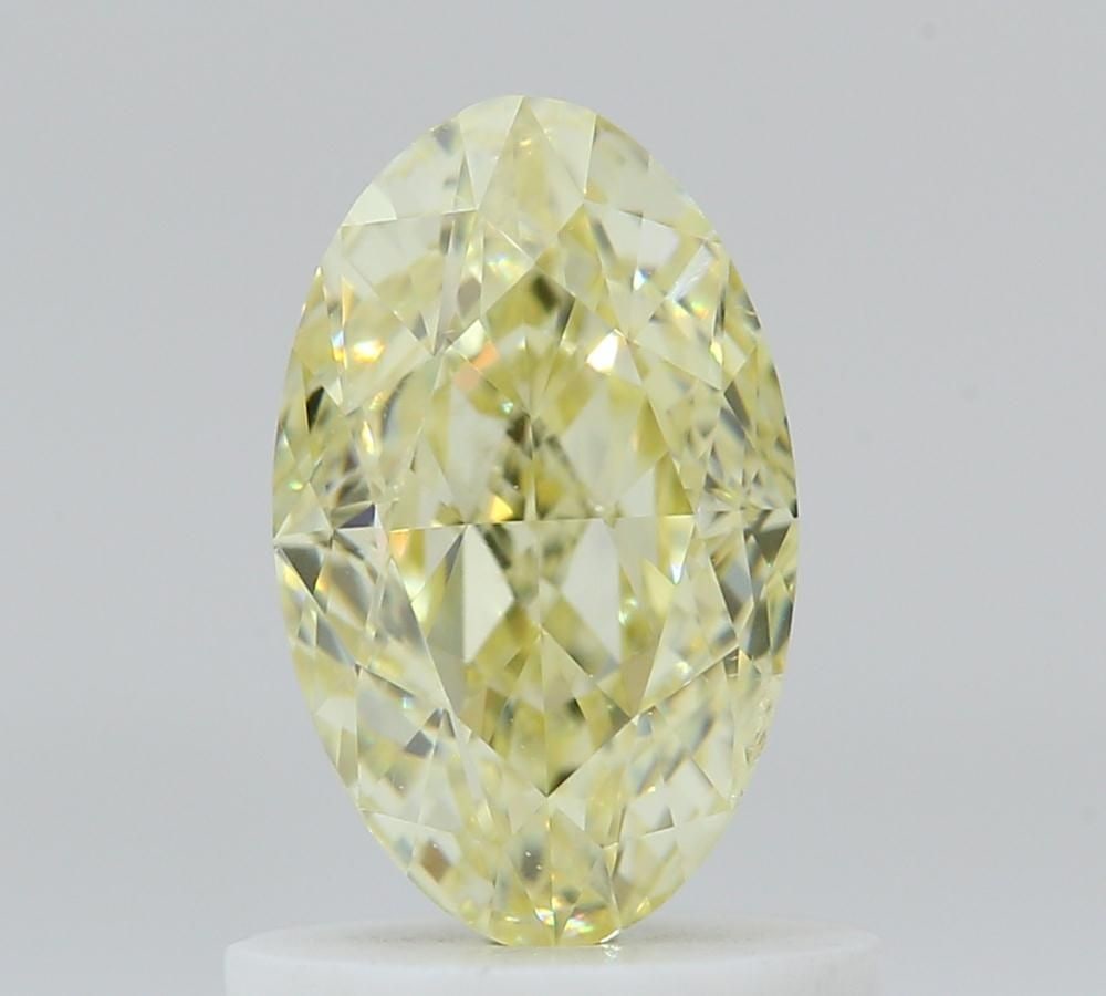 Loose Diamond - OVAL 1.01ct Fancy Light Yellow VS2: Loose Diamond - OVAL 1.01ct Fancy Light Yellow VS2 Source: Natural Shape: OVAL Carats: 1.01 Color: Fancy Light Yellow Certification: GIA Video: