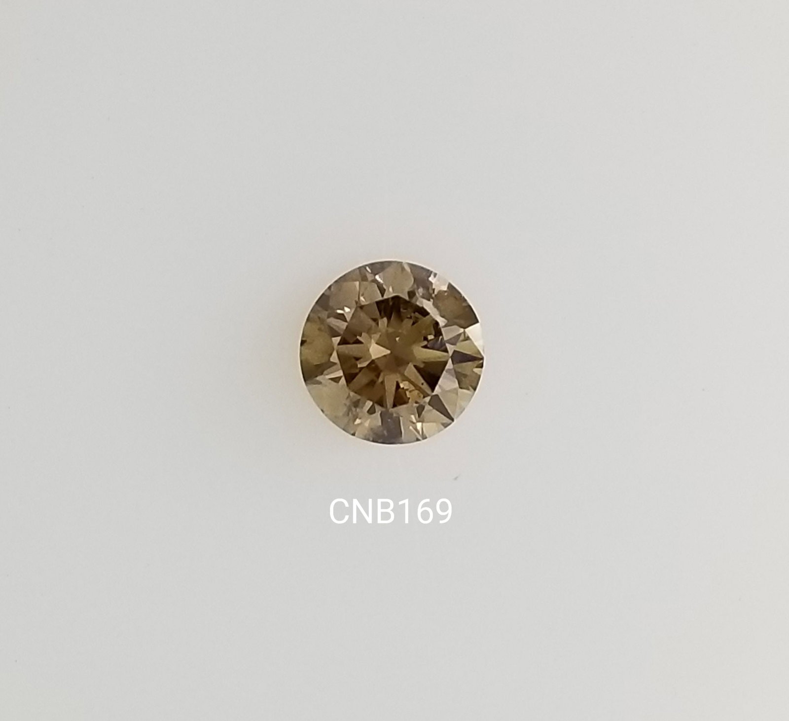 Loose Diamond - ROUND 0.64ct Fancy Vivid Cognac I1 (1 of 1)
