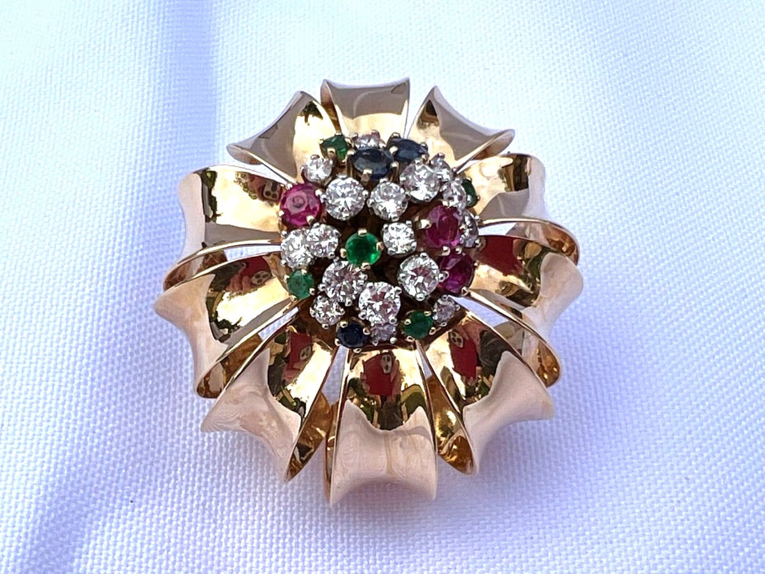 I. Jubelin 18K Gold Diamond Ruby Sapphire Emerald Brooch Vintage: I. Jubelin 18K Gold Diamond Ruby Sapphire Emerald Brooch Vintage This exquisite 18K gold brooch from the 1960s features a stunning arrangement of diamonds, rubies, emeralds, and sapphires, crafted by 